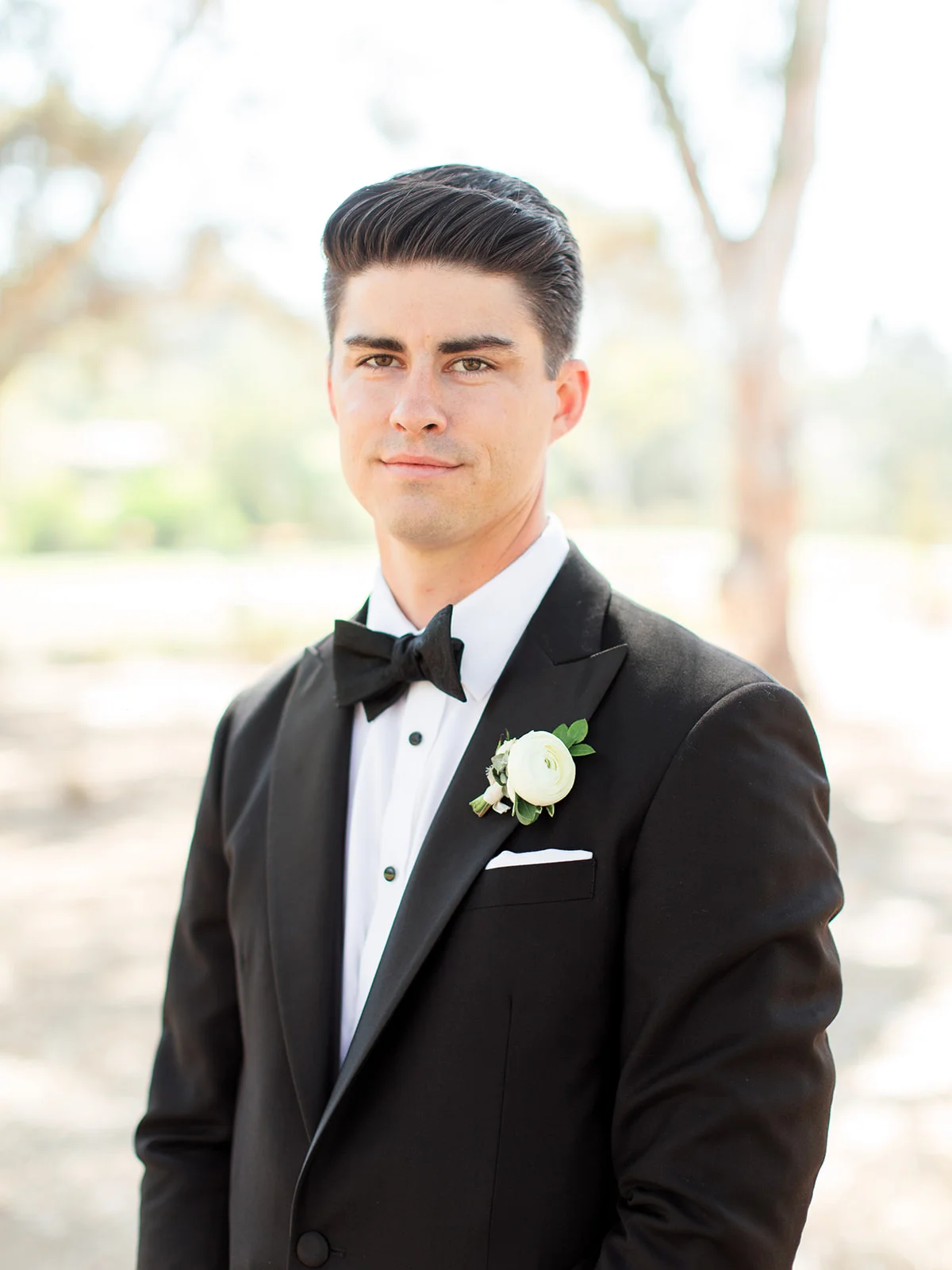 Groom in black tux and bowtie | Rancho Santa Fe Golf Club | Compass Floral | Wedding Florist in San Diego and Southern California | Rachael McCall Photography