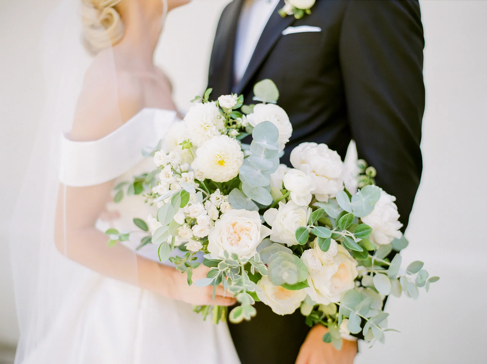 Loose, organic white dahlia, rose and eucalyptus bridal bouquet | Rancho Santa Fe Golf Club | Compass Floral | Wedding Florist in San Diego and Southern California | Rachael McCall Photography