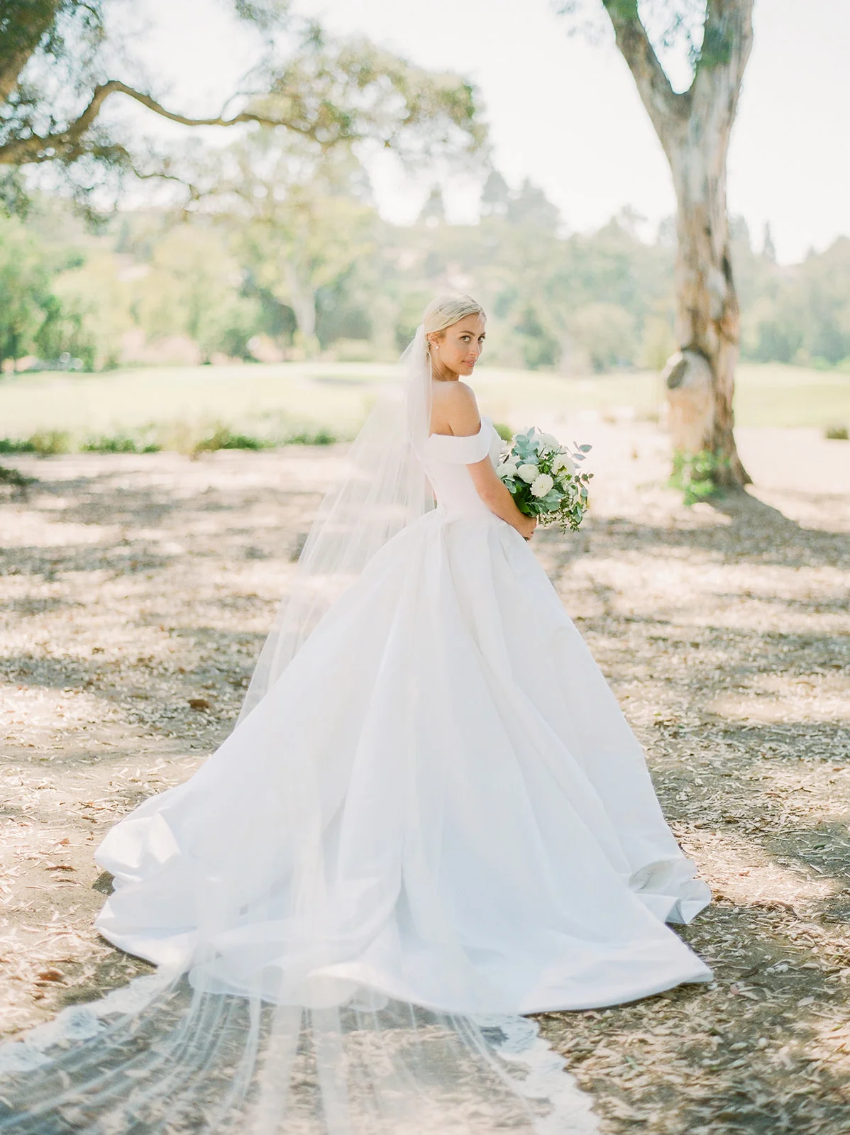 Cathedral length veil and bride with lush white & green bouquets | Rancho Santa Fe Golf Club | Compass Floral | Wedding Florist in San Diego and Southern California | Rachael McCall Photography