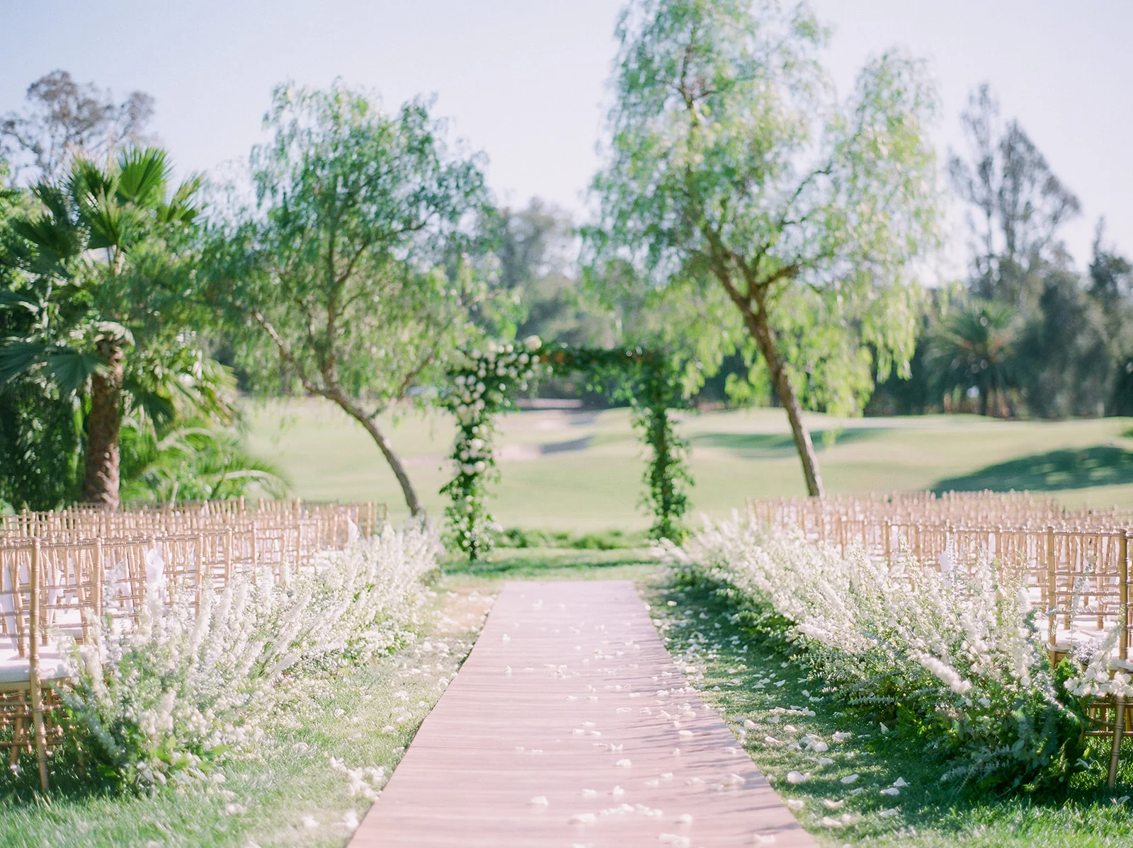 Flower lined aisle, outdoor wedding ceremony | Rancho Santa Fe Golf Club | Compass Floral | Wedding Florist in San Diego and Southern California | Rachael McCall Photography