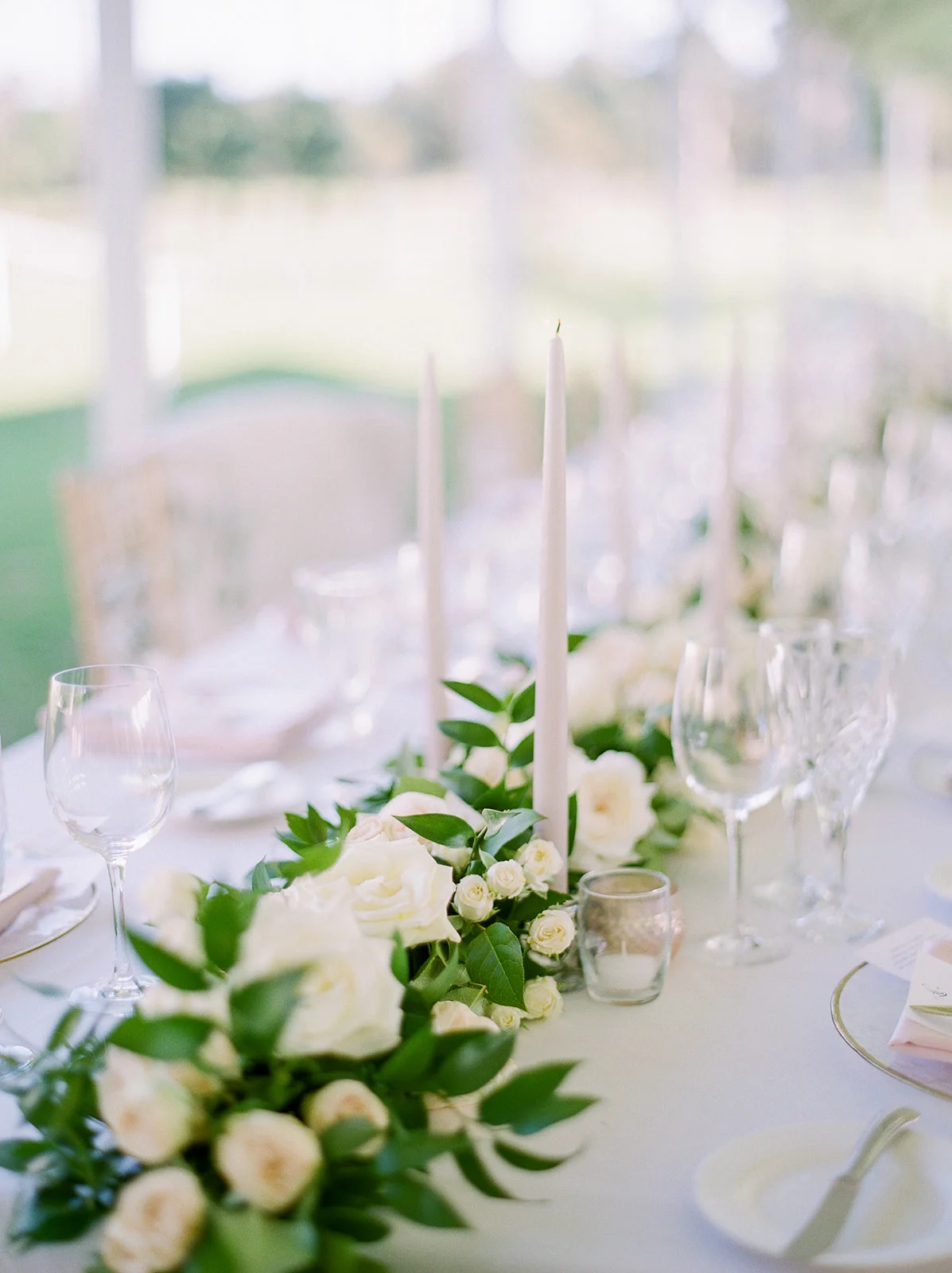 White flower garland with taper candles | Rancho Santa Fe Golf Club | Compass Floral | Wedding Florist in San Diego and Southern California | Rachael McCall Photography