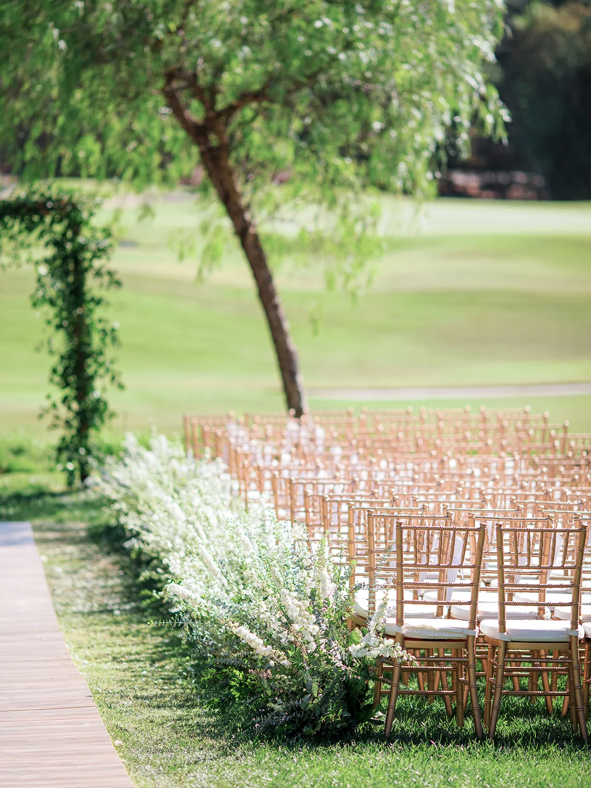 Outdoor wedding ceremony, flower lined aisle | Rancho Santa Fe Golf Club | Compass Floral | Wedding Florist in San Diego and Southern California | Rachael McCall Photography