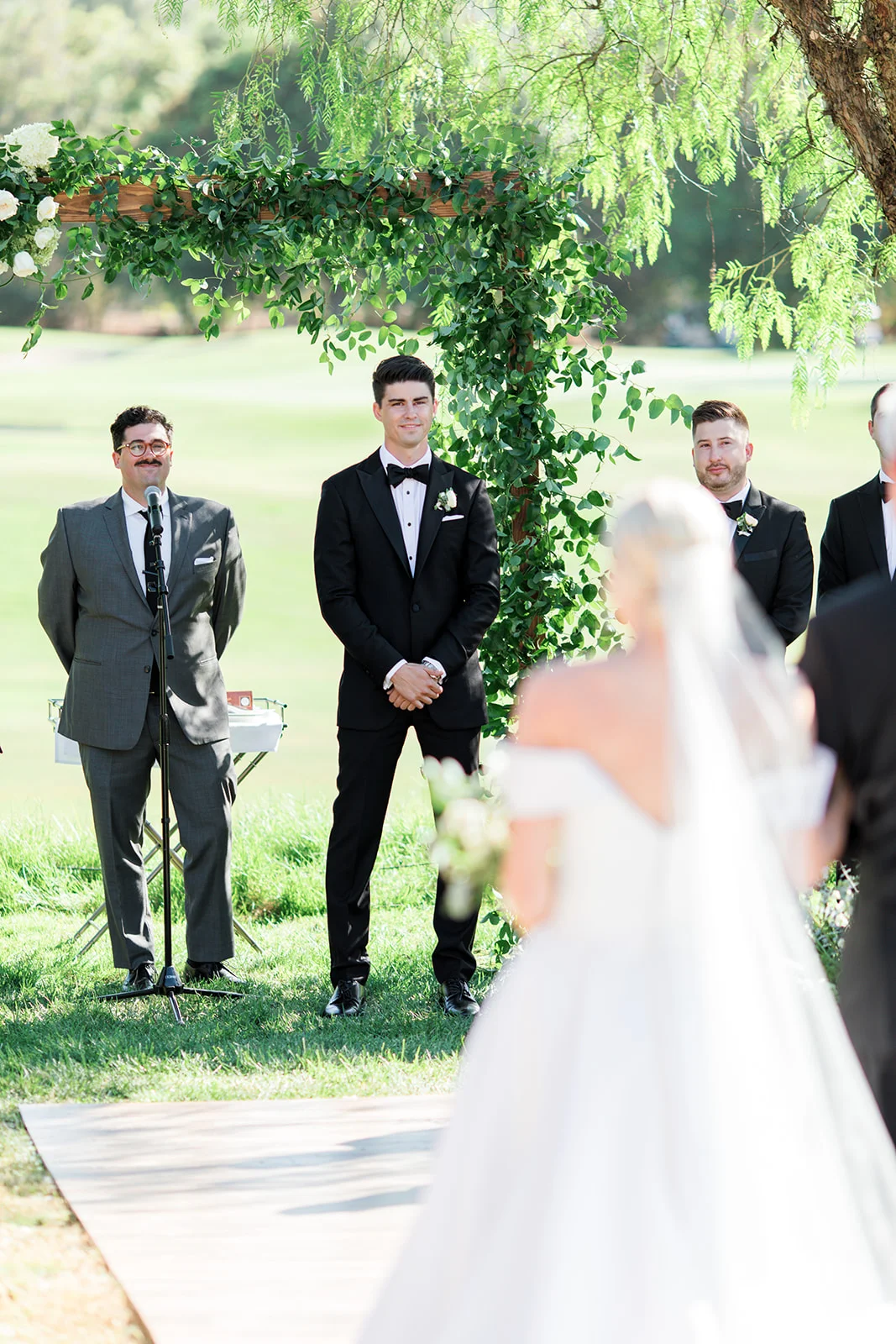 Bride walking down aisle | Rancho Santa Fe Golf Club | Compass Floral | Wedding Florist in San Diego and Southern California | Rachael McCall Photography