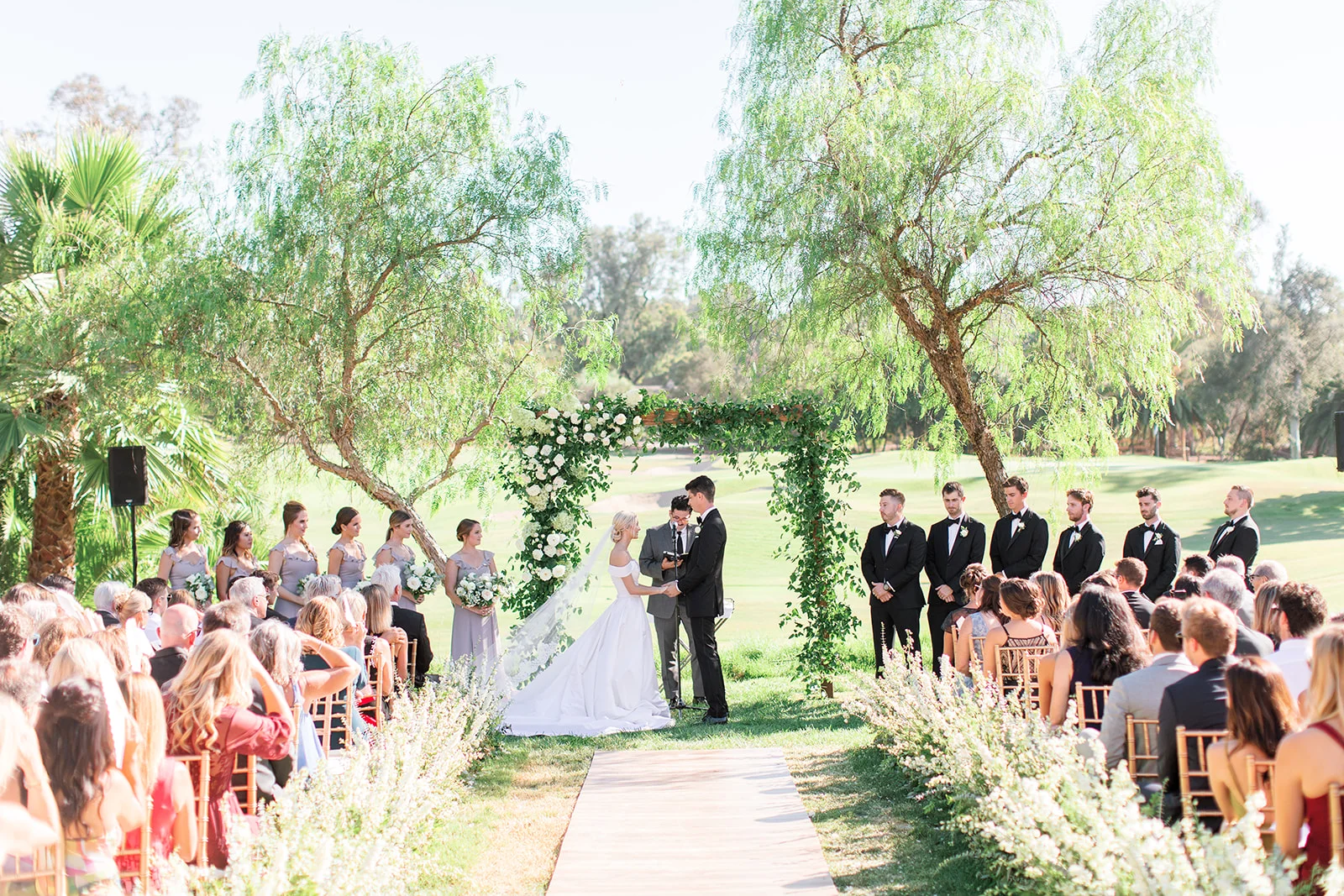 Outdoor wedding ceremony, flower lined aisle | Rancho Santa Fe Golf Club | Compass Floral | Wedding Florist in San Diego and Southern California | Rachael McCall Photography
