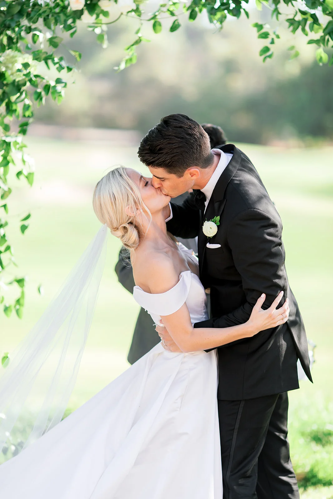 Outdoor wedding ceremony, first kiss | Rancho Santa Fe Golf Club | Compass Floral | Wedding Florist in San Diego and Southern California | Rachael McCall Photography