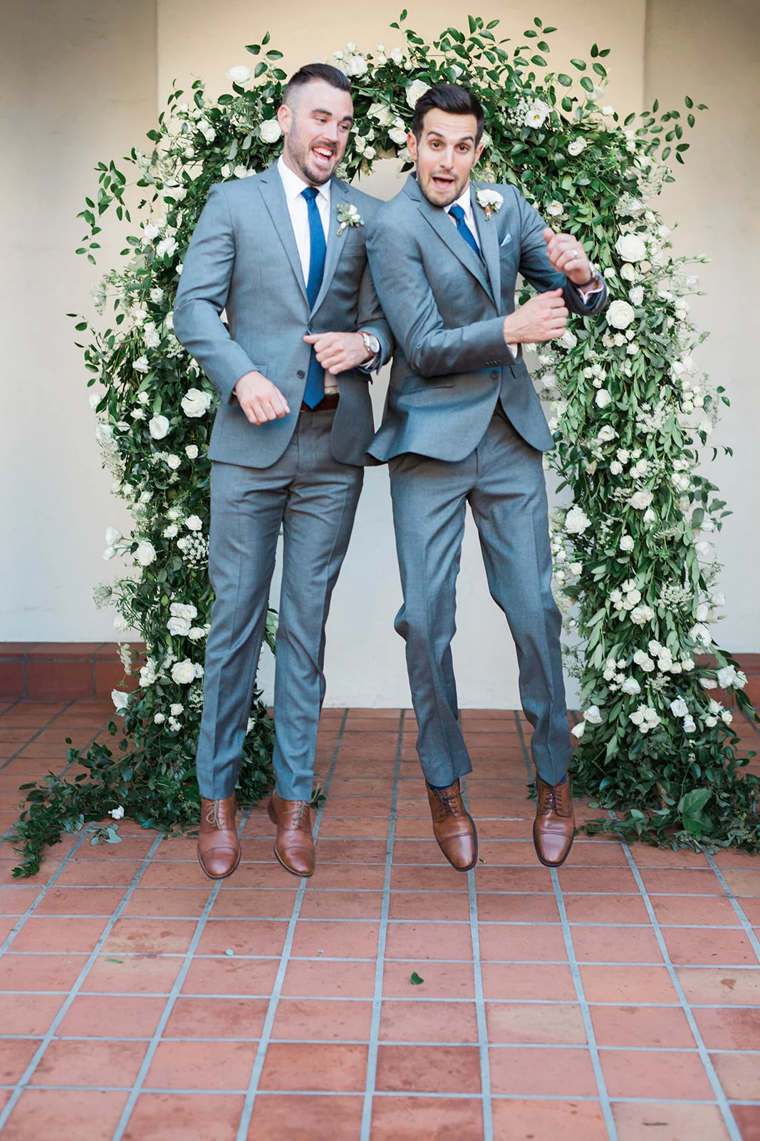 Fun groomsmen poses, elegant greenery arch | Darlington House, La Jolla | Compass Floral | Wedding Florist in San Diego and Southern California | My Sun and Stars Co. Photography