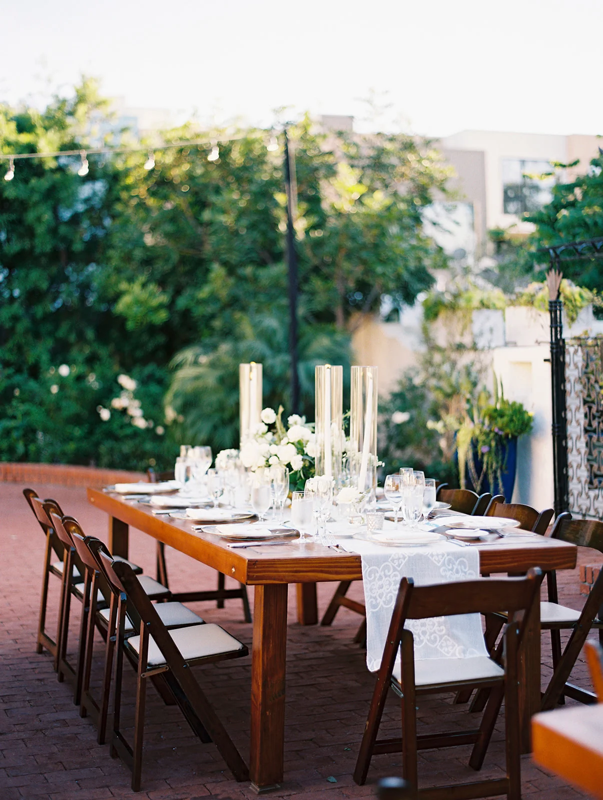 Taper candle and flower centerpiece | Darlington House, La Jolla | Compass Floral | Wedding Florist in San Diego and Southern California | My Sun and Stars Co. Photography