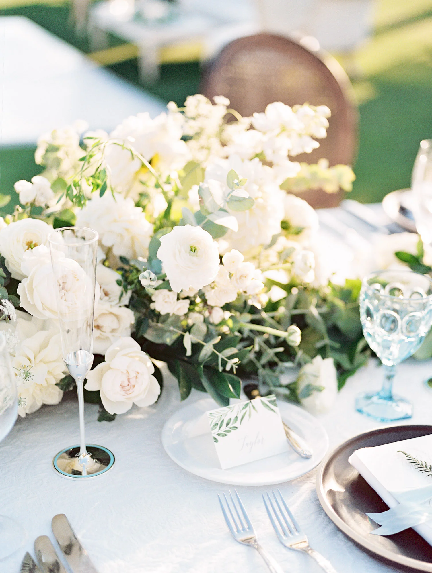 White rose and ranunculus sweetheart table centerpiece | Del Mar Country Club | Compass Floral | Wedding Florist in San Diego and Southern California | Cavin Elizabeth Photography