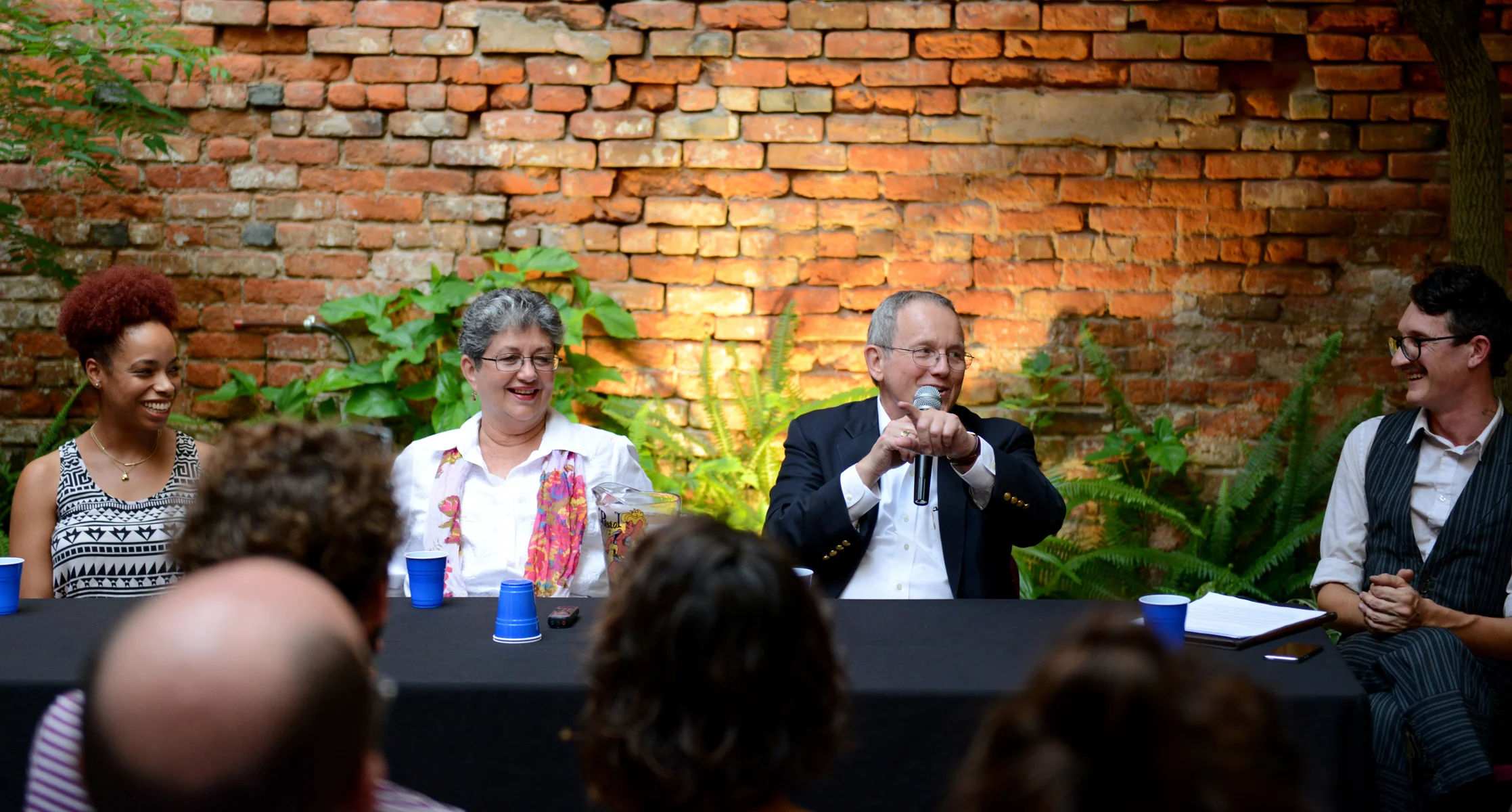 The evening, entitled "Ouch: The Body in and Out of Pain", consisted of a panel discussion about the physiological and sociological aspects of pain, as well as an excerpt from GRP's new piece, Numb. Pictured are the three panelists, Amina D. Massey, Becca Begnaud, and Harry Gould, as well as Owen Ever, who facilitated. 