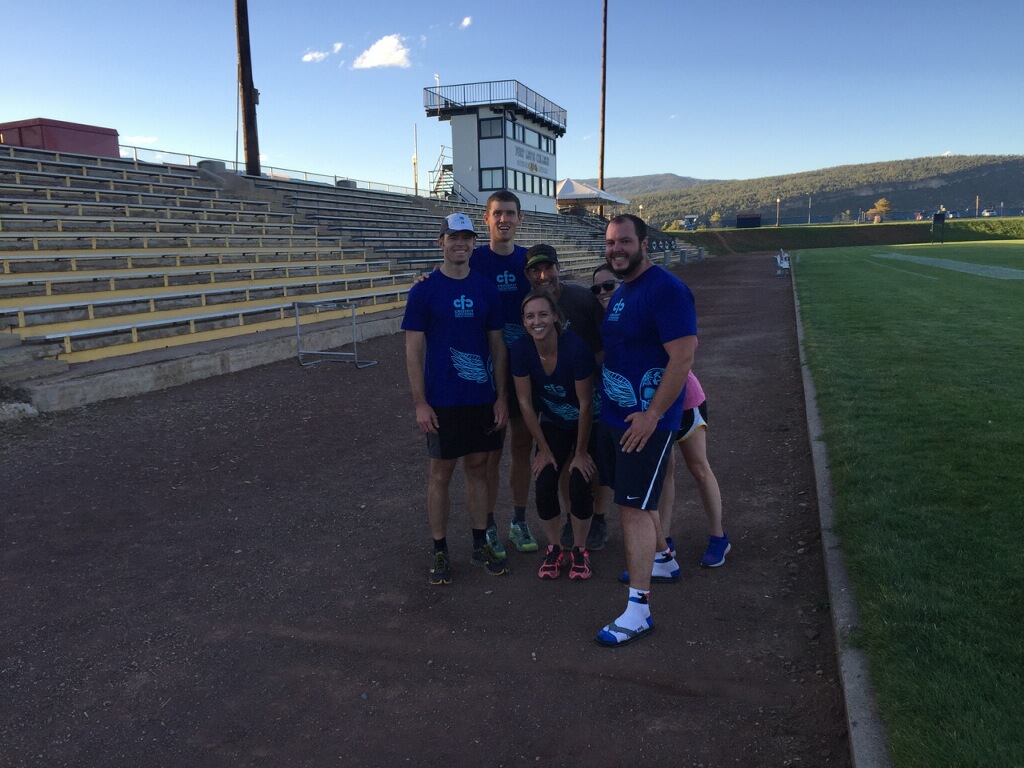 A subset of the endurance team is glad it is friday. that means their track workout is behind them.