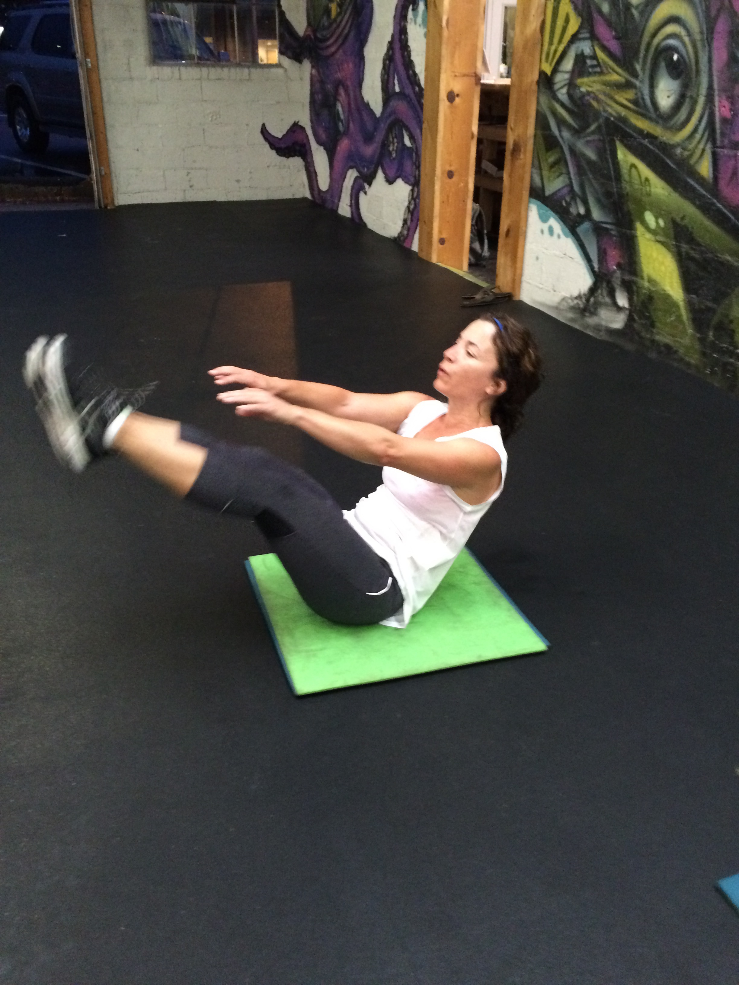 Kris digging the v-ups in yesterday's workout.