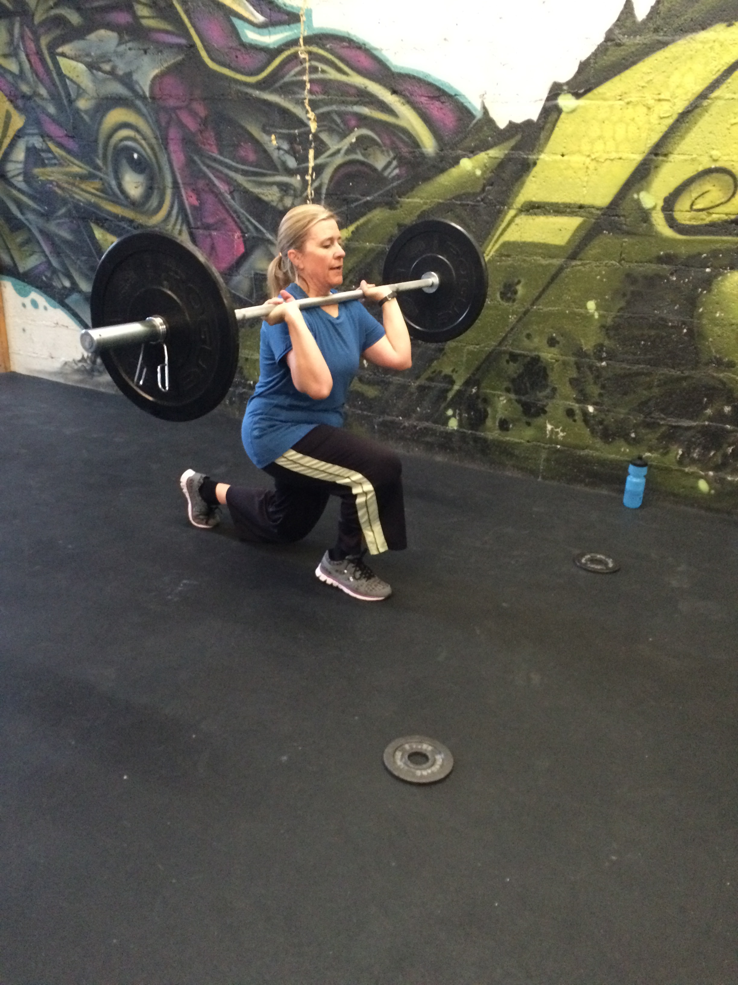 Kristen demonstrating some focus on front rack lunges last week. Shes probably thanking us for those right now as she is on a backcountry ski trip. Actually, she probably isn't thanking us.