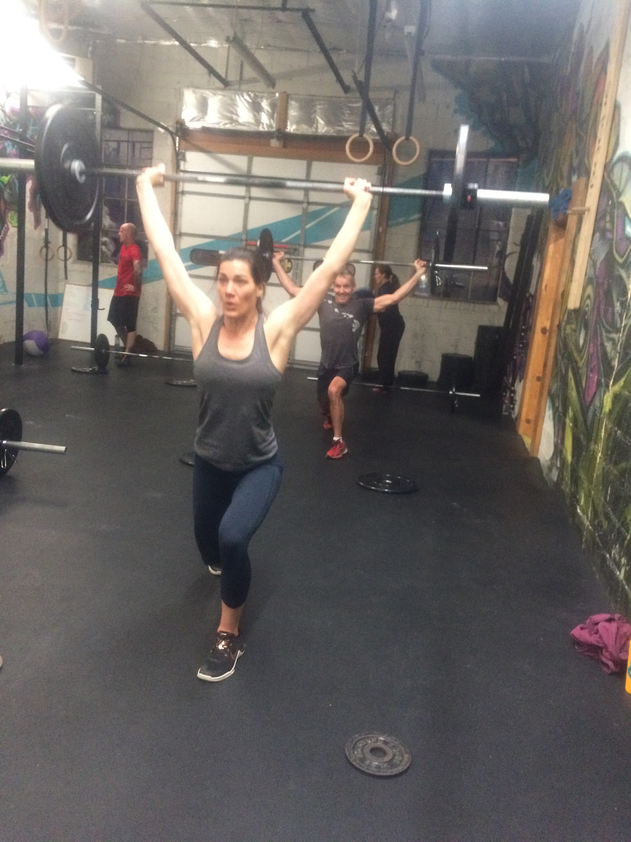 Stacey and Andy repping overhead lunges last week.