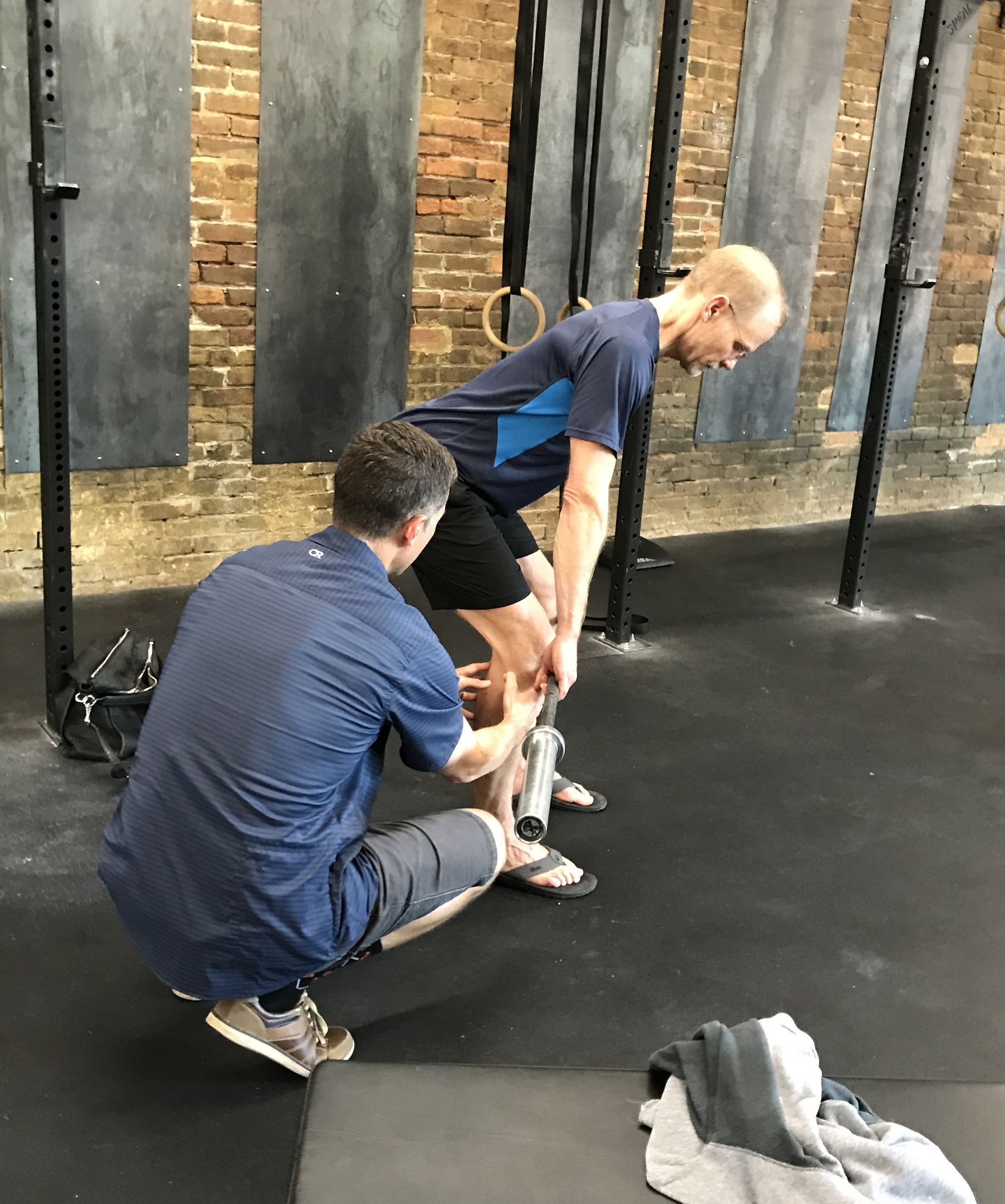 Dr. Luke with Mercy Sports Medicine getting hands on at Pro Night.
