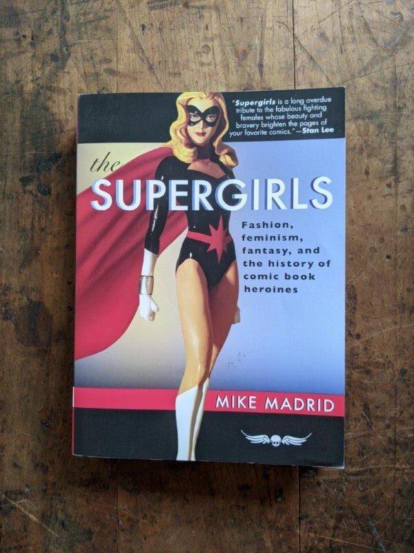 The Supergirls: Fashion, Feminism, Fantasy, and the History of Comic Book Heroines -  Mike Madrid