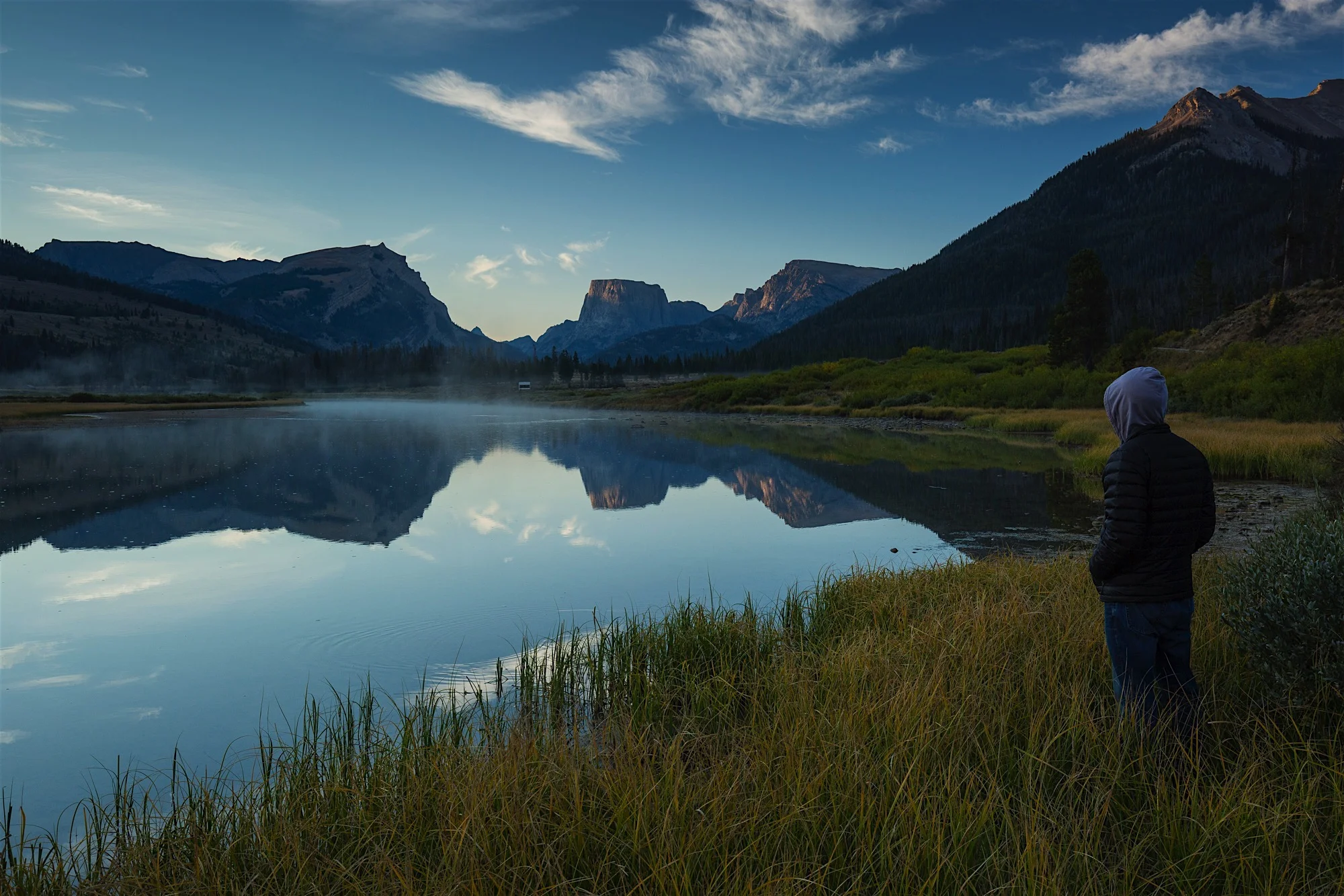 A man watching sunrise in the upper Green River Valley