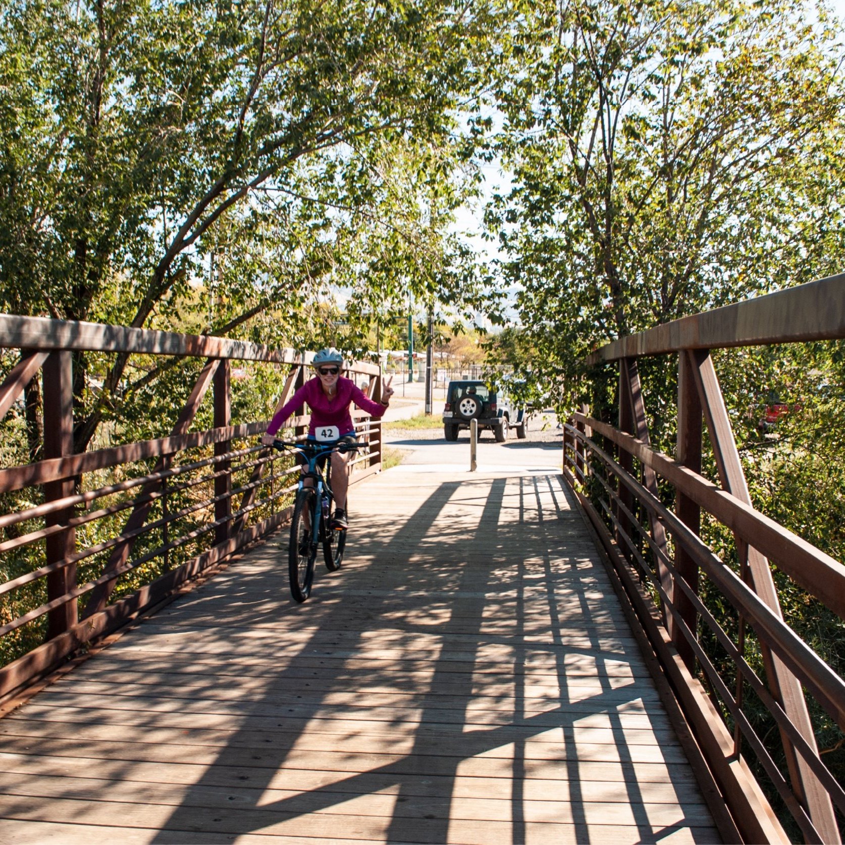 Peace+Sign+Bike+Leg+on+Jordan+River+Bridge+during+2022+Range+2+River+Relay+in+Salt+Lake+City.jpg