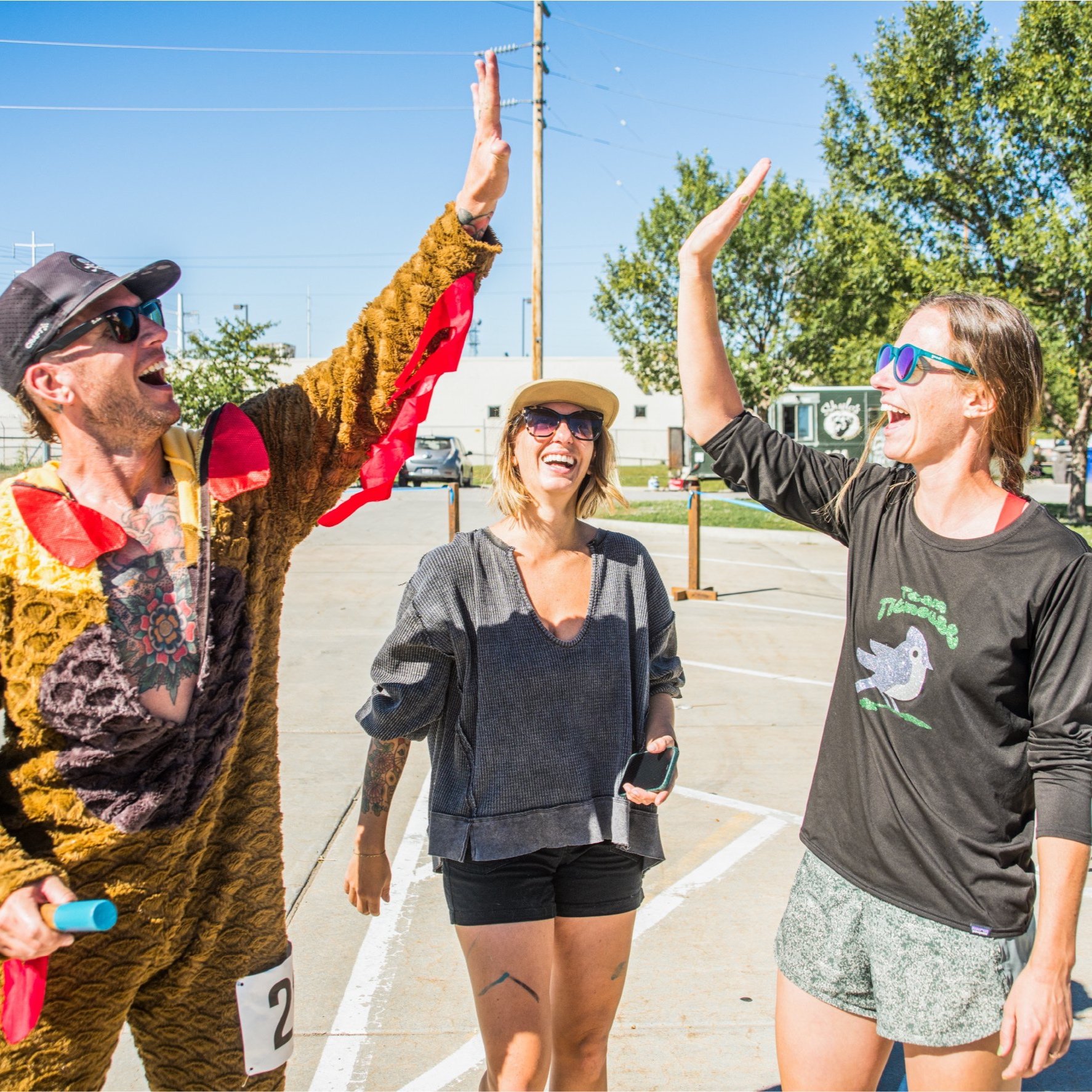 Team+High+Fives+at+Finish+Line+Celebration+of+Range+2+River+Relay+2022+Photo+by+David+Ricketts.jpg