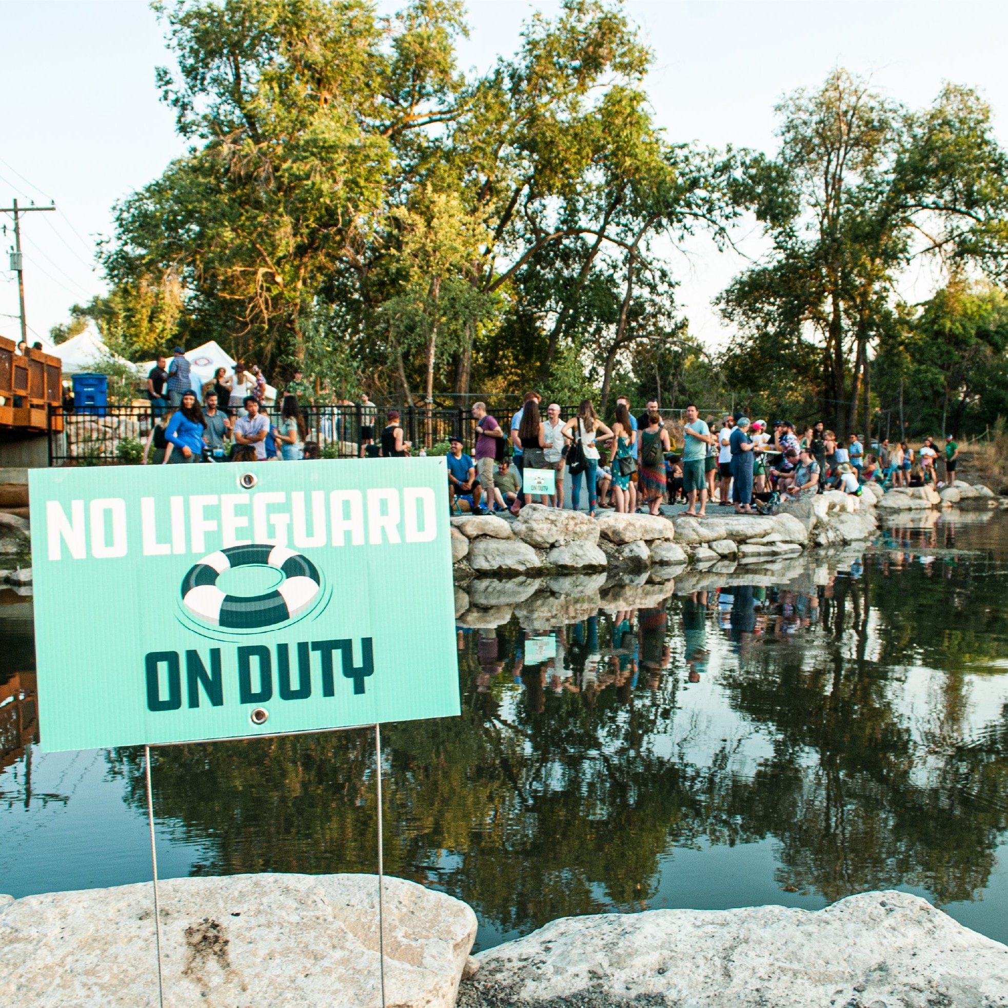 No+Lifeguards+on+Duty+Sign+at+the+Three+Creeks+Confluence+Opening+Celebration+in+Salt+Lake+City.jpg