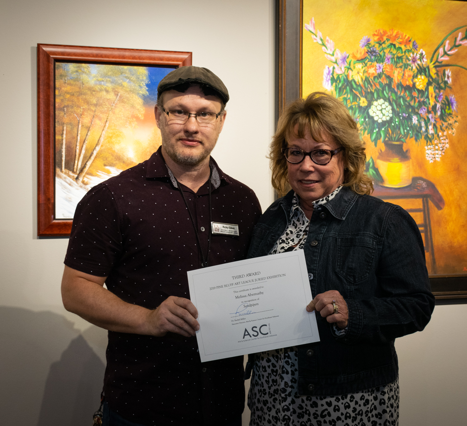 Melissa Abernathy (right, with juror Ricky Sikes) was awarded Third Place for her photograph  Sandpipers.  