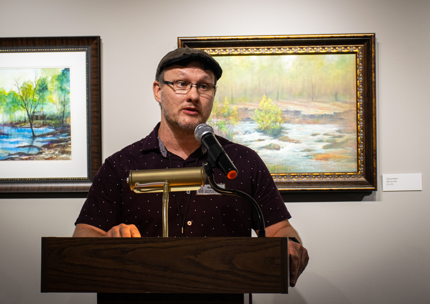  Juror Ricky Sikes, who is an artist-in-residence at University of Arkansas-Little Rock, speaks during the opening reception. 
