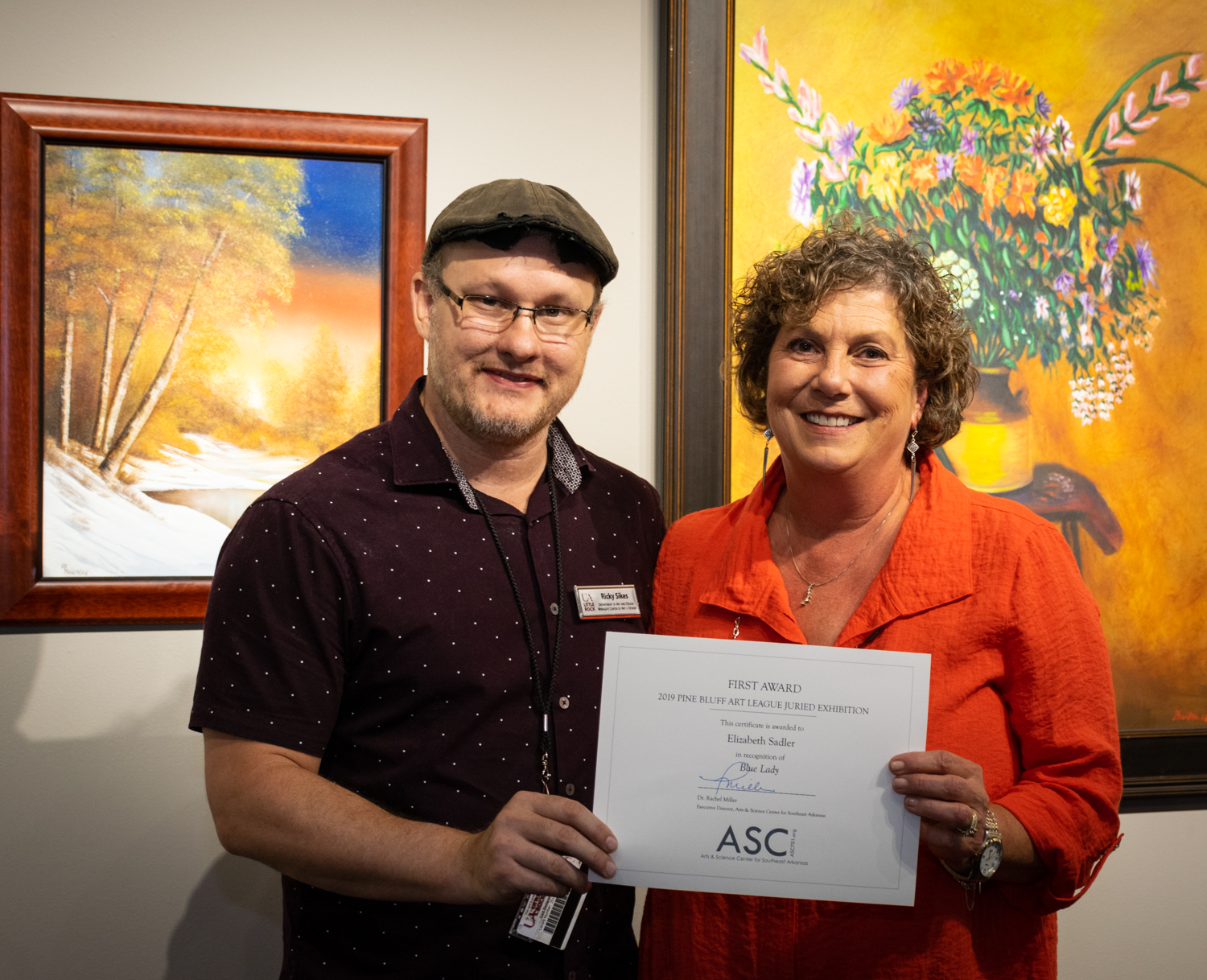  Elizabeth Sadler (right, with juror Ricky Sikes) was awarded First Place for  Blue Lady.  