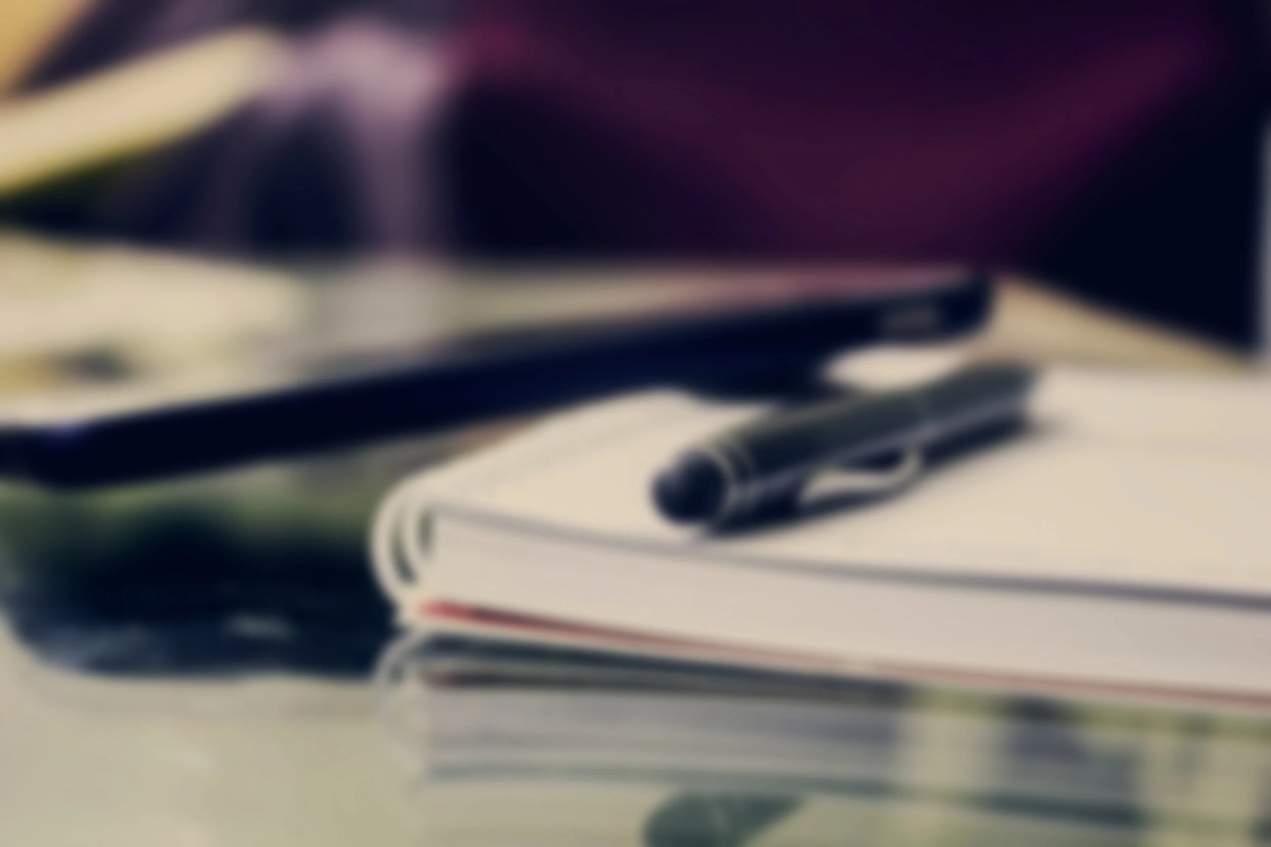 black-twist-pen-on-notebook-891059.jpg