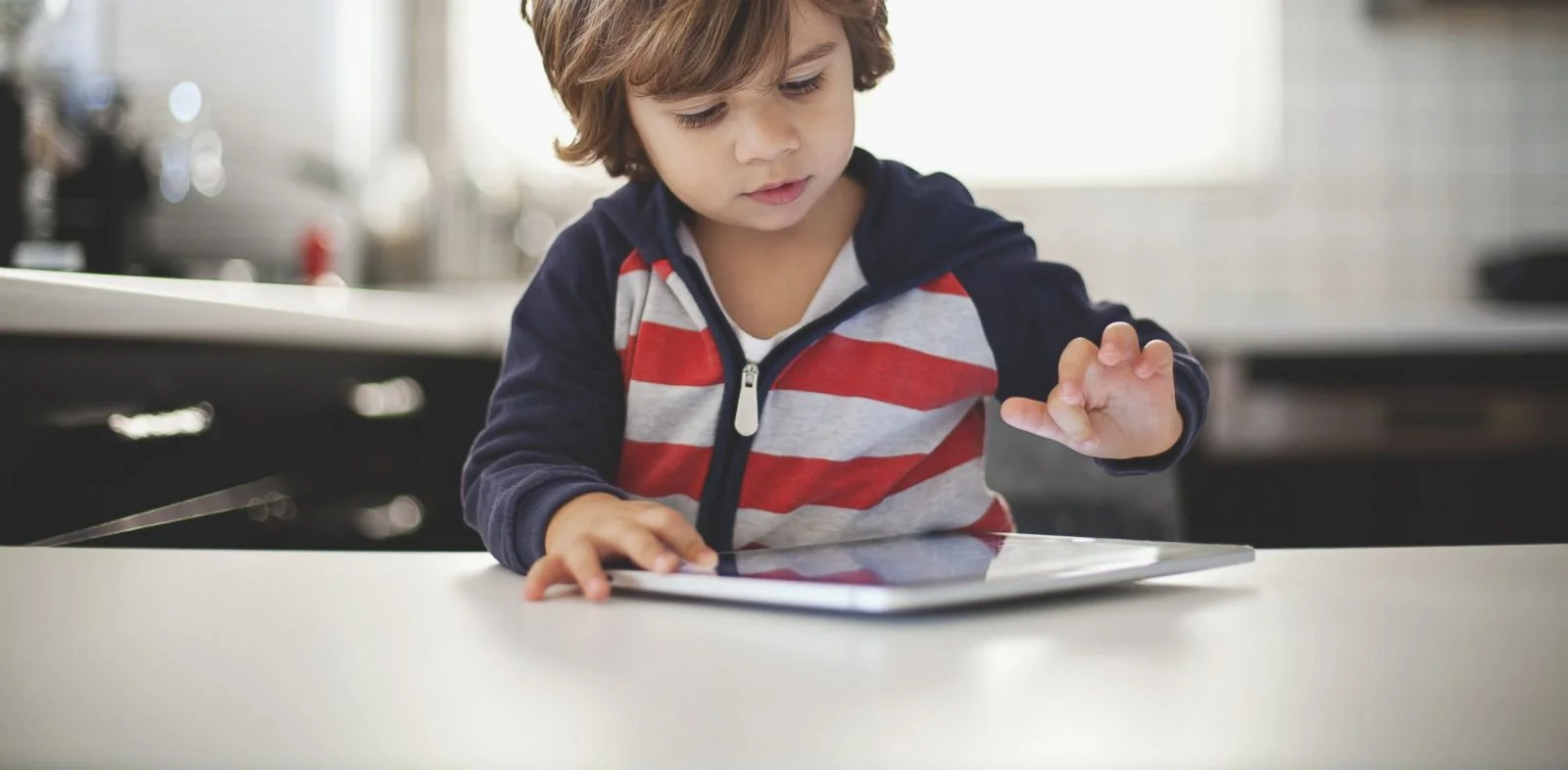 GTY_kid_ipad_sr_131127_33x16_1600.jpg