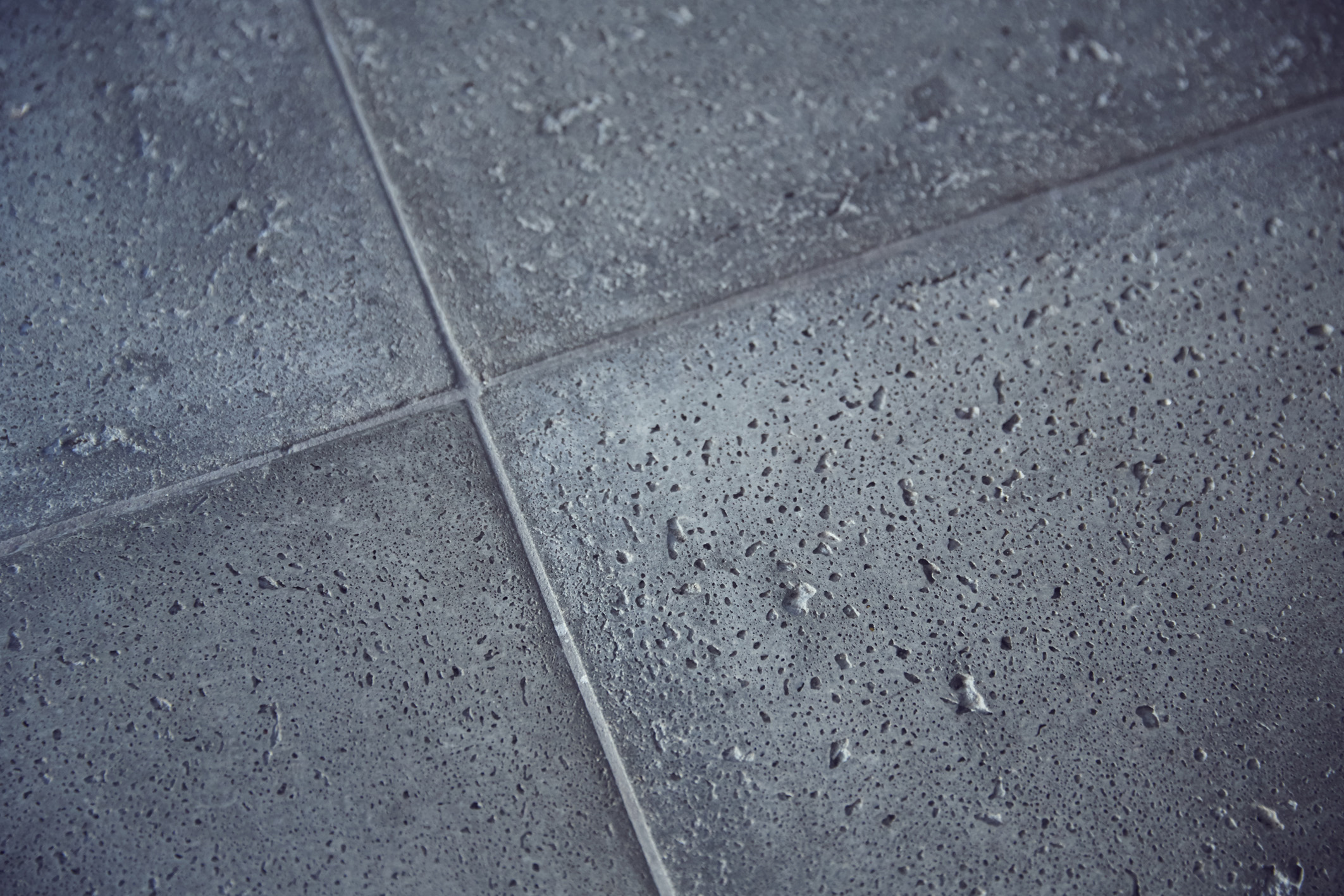textured-concrete-tile-close-up.jpeg