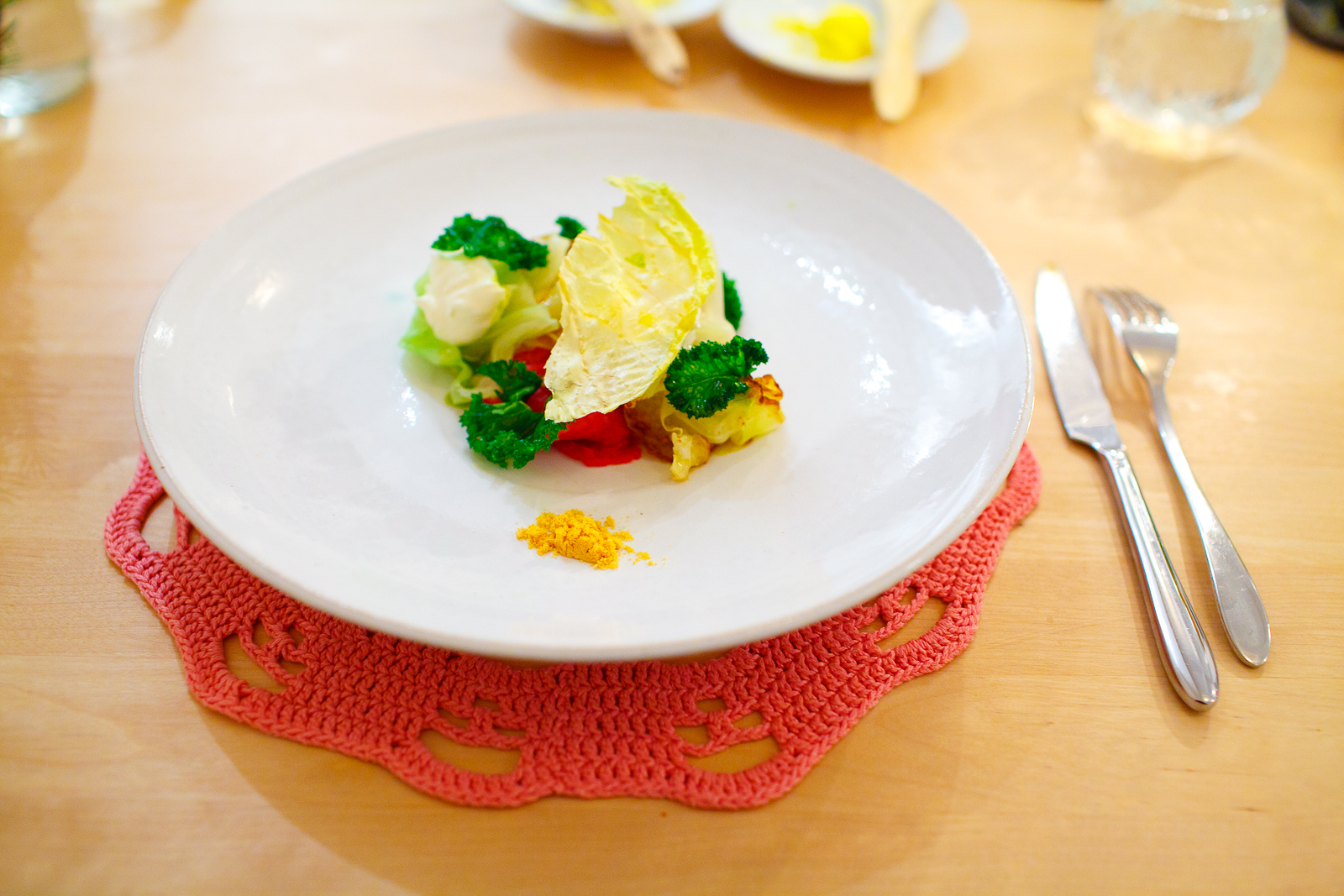 Mistral, Stockholm - Slices of raw lamb with baked and fried dried kale and cabbage, trout roe salt
