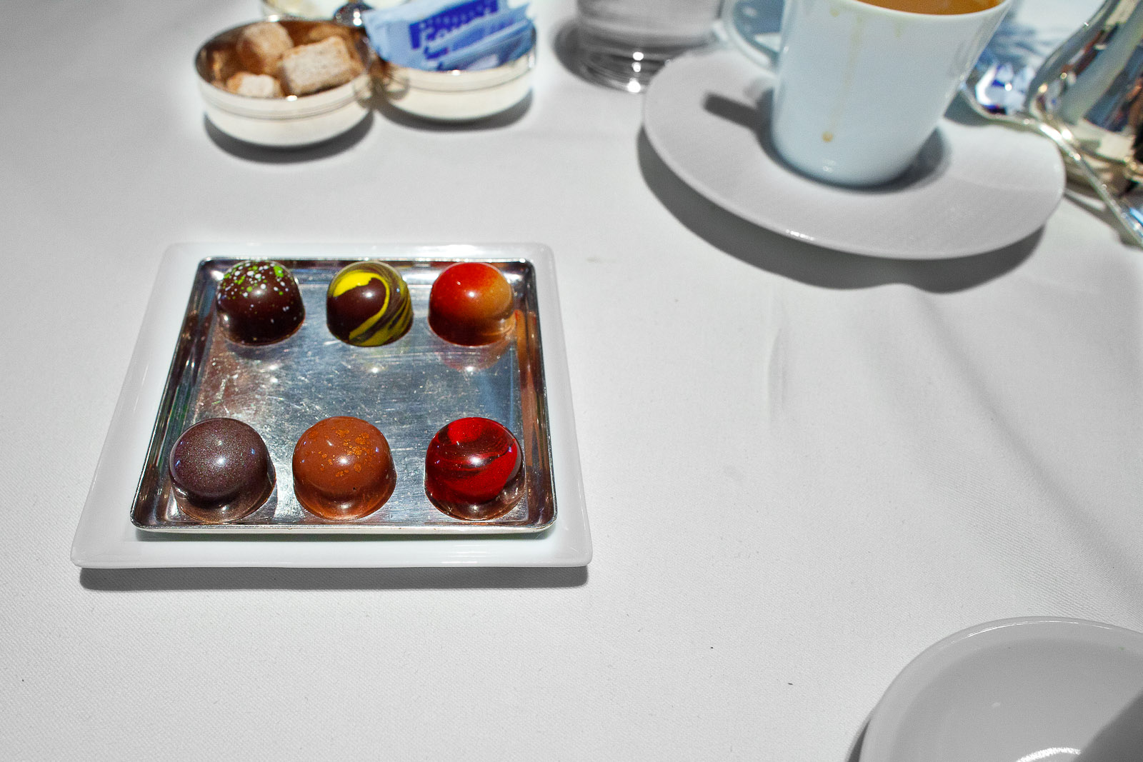 Mignardises- Chocolates - (clockwise) Olive Oil, Meyer Lemon, Peanut Butter and Jelly, Michigan Cherry, Hazelnut, Ginger