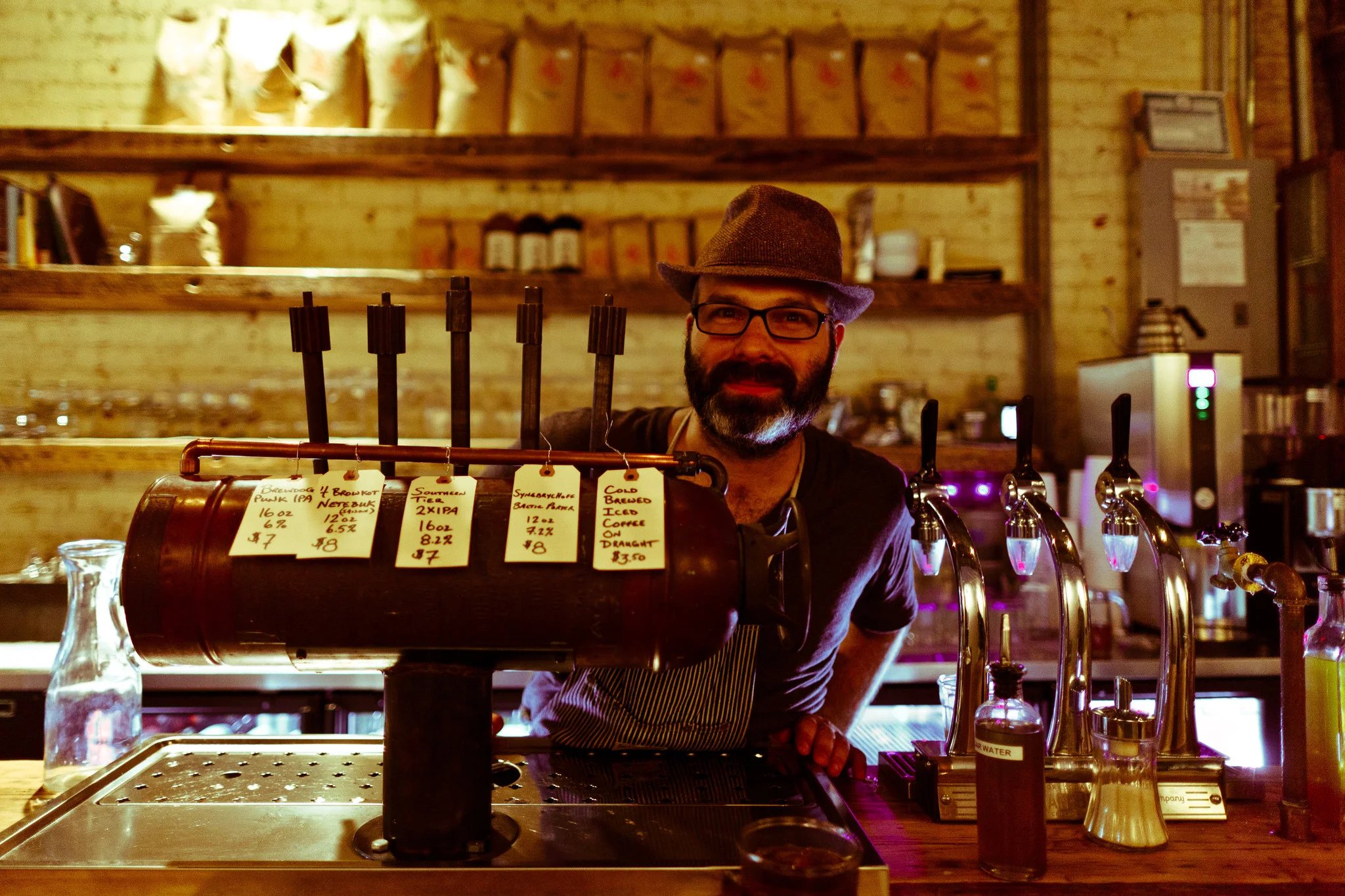 Owner Ben Sandler showing Coffee on Tap