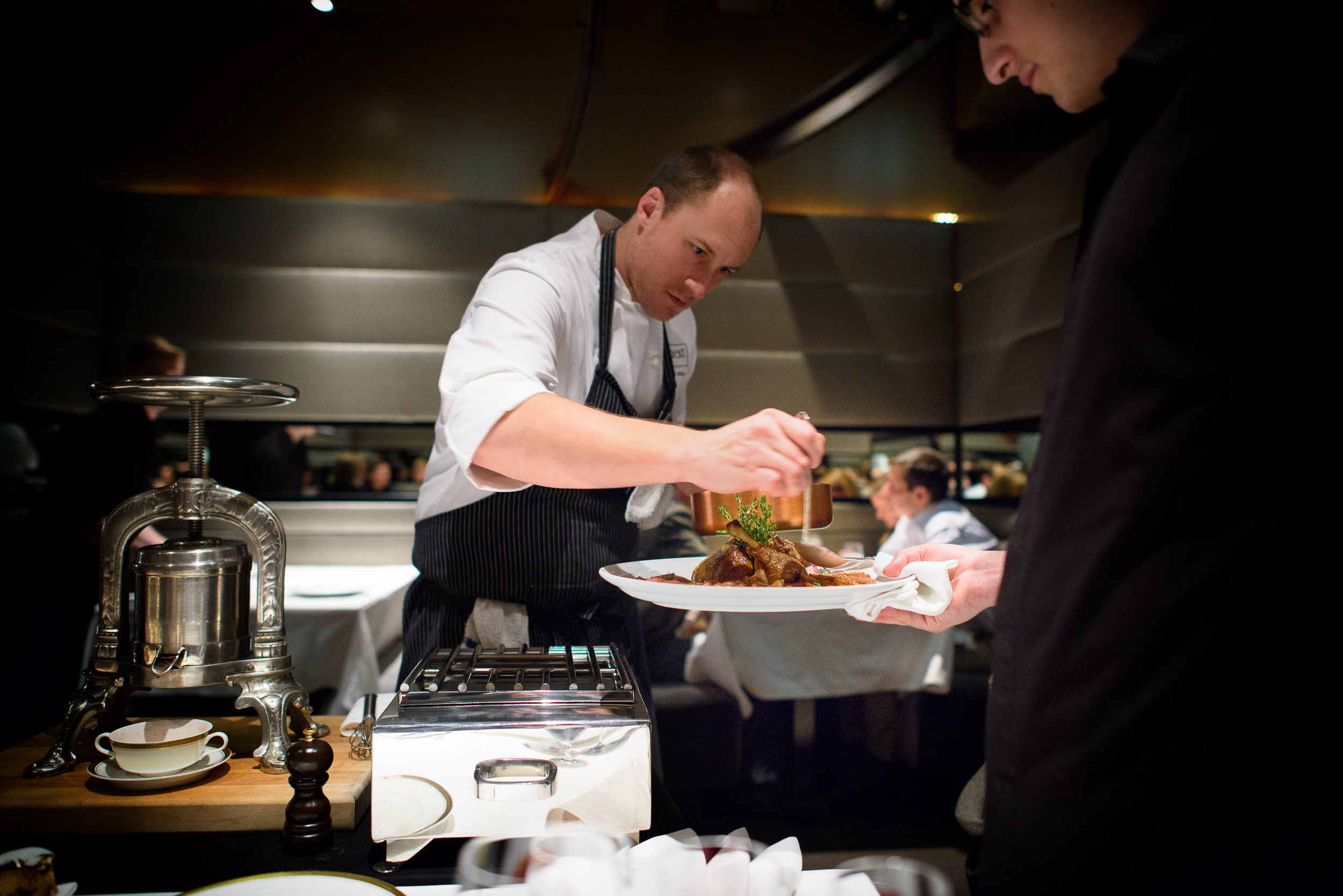 11th Course: Chef Dave Beran saucing the duck