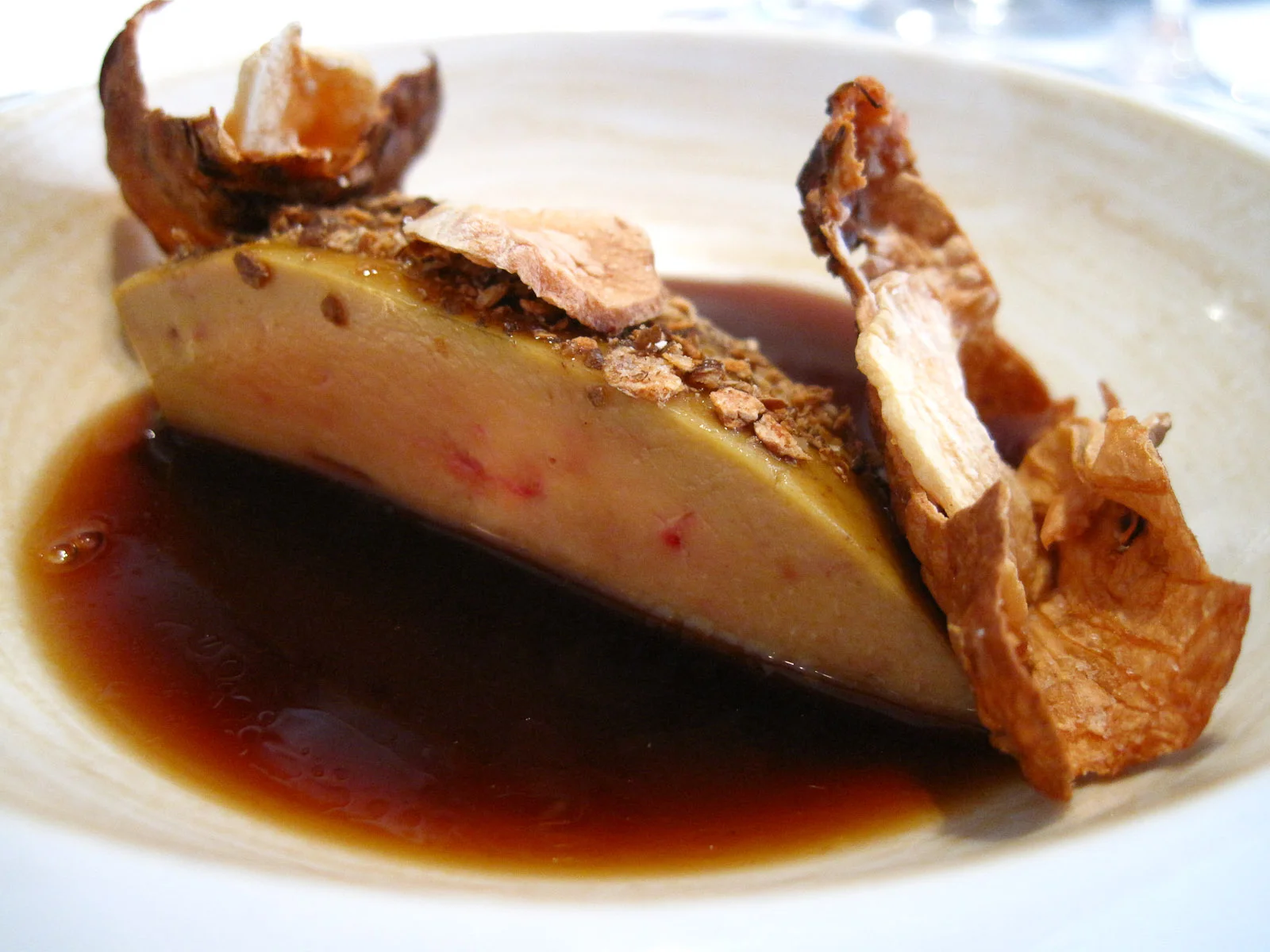7th Course Wood. Piece of foie gras roasted and allowed to stand with the woods.