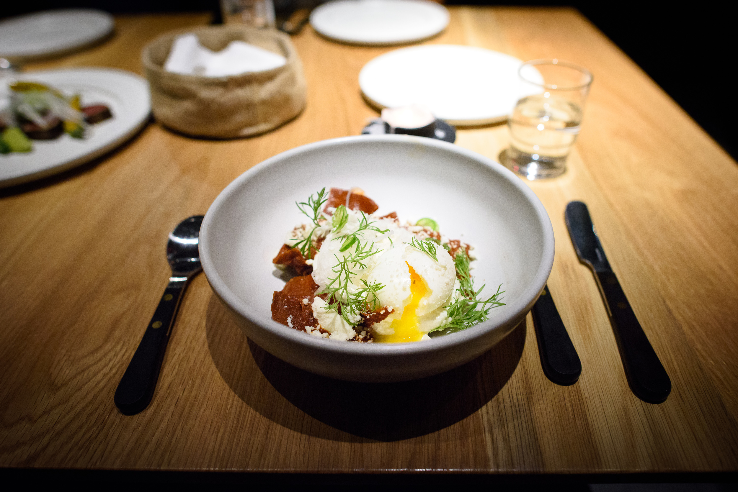 Chilaquiles, salsa roja, queso fresco, runny egg