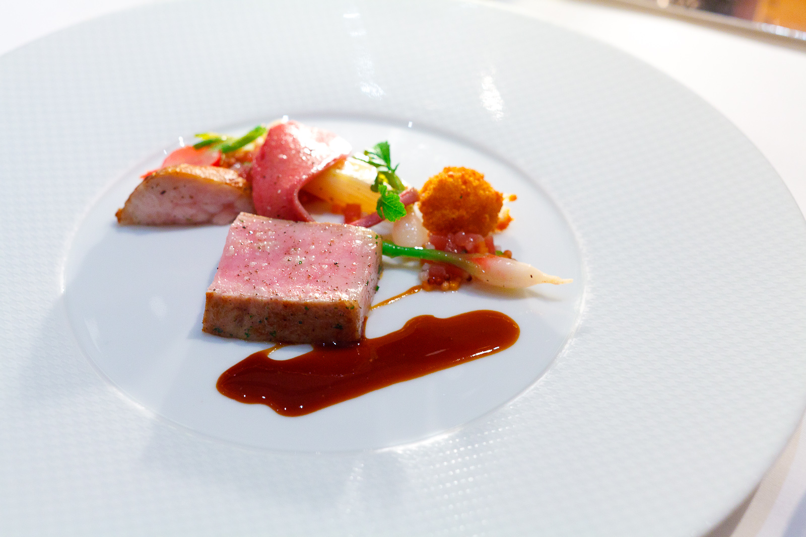 16th Course: Degustation of marcho farm's veal, marinated new crop potatoes, young onions and cherry belle radishes with veal sauce