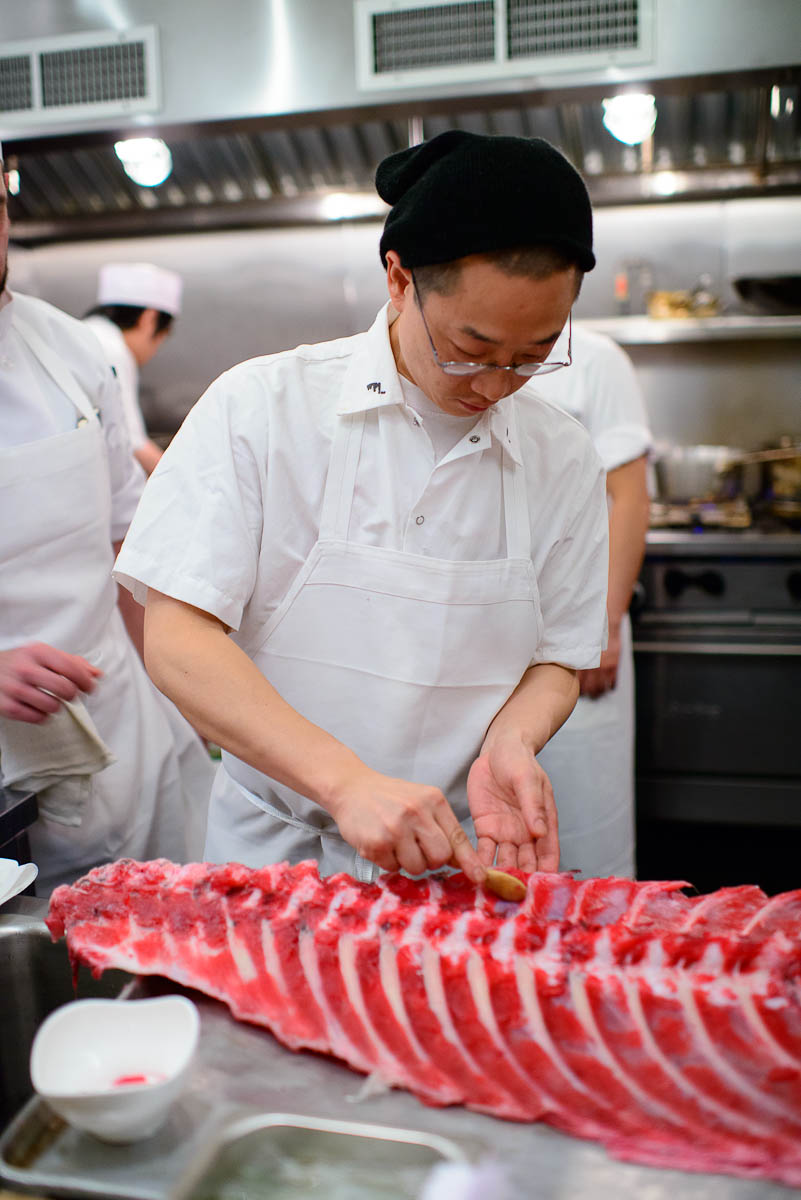 Chef Nick Kim scraping lean tuna from the bone