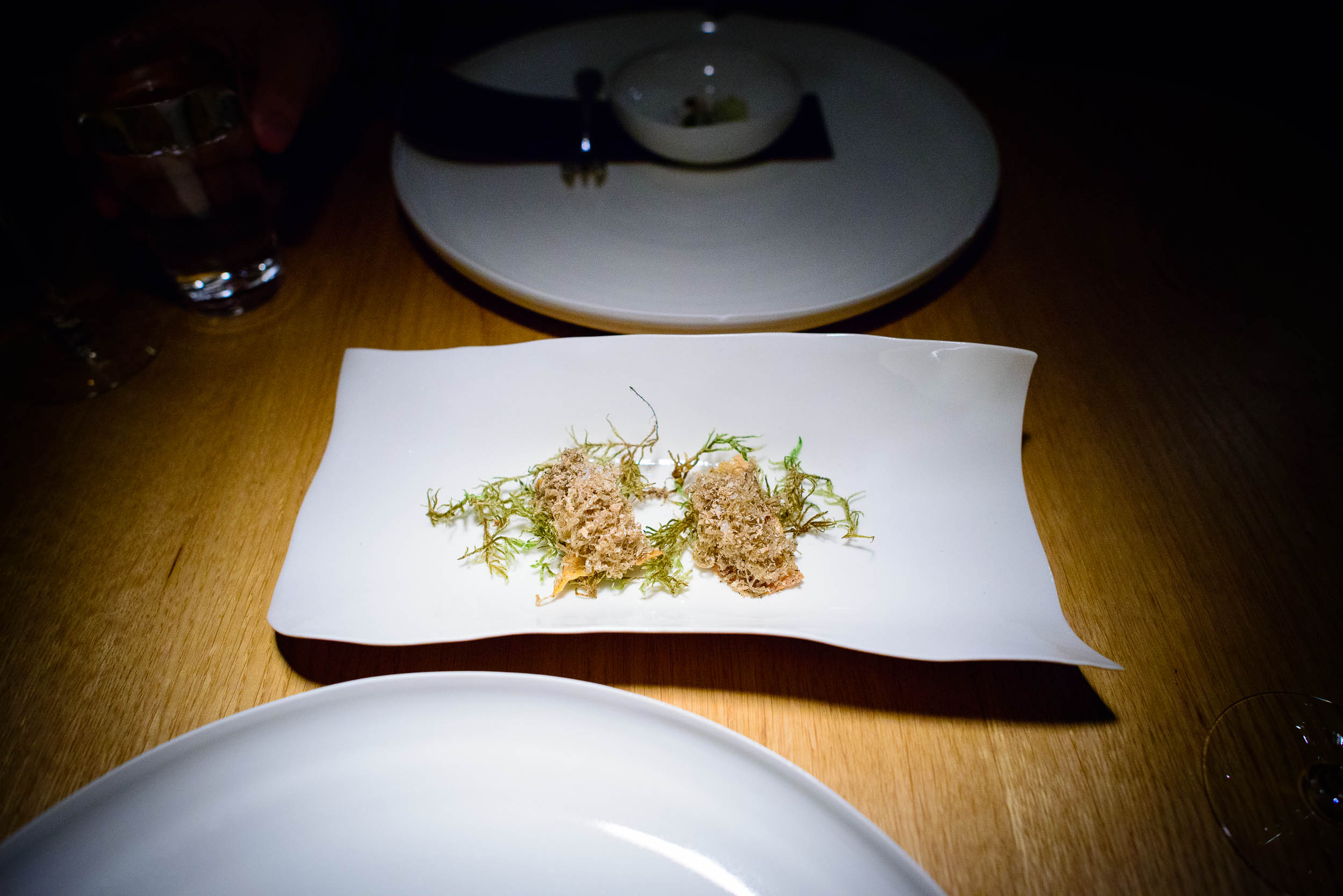 Deep-fried chicken skin with truffle cream, grated fermented por