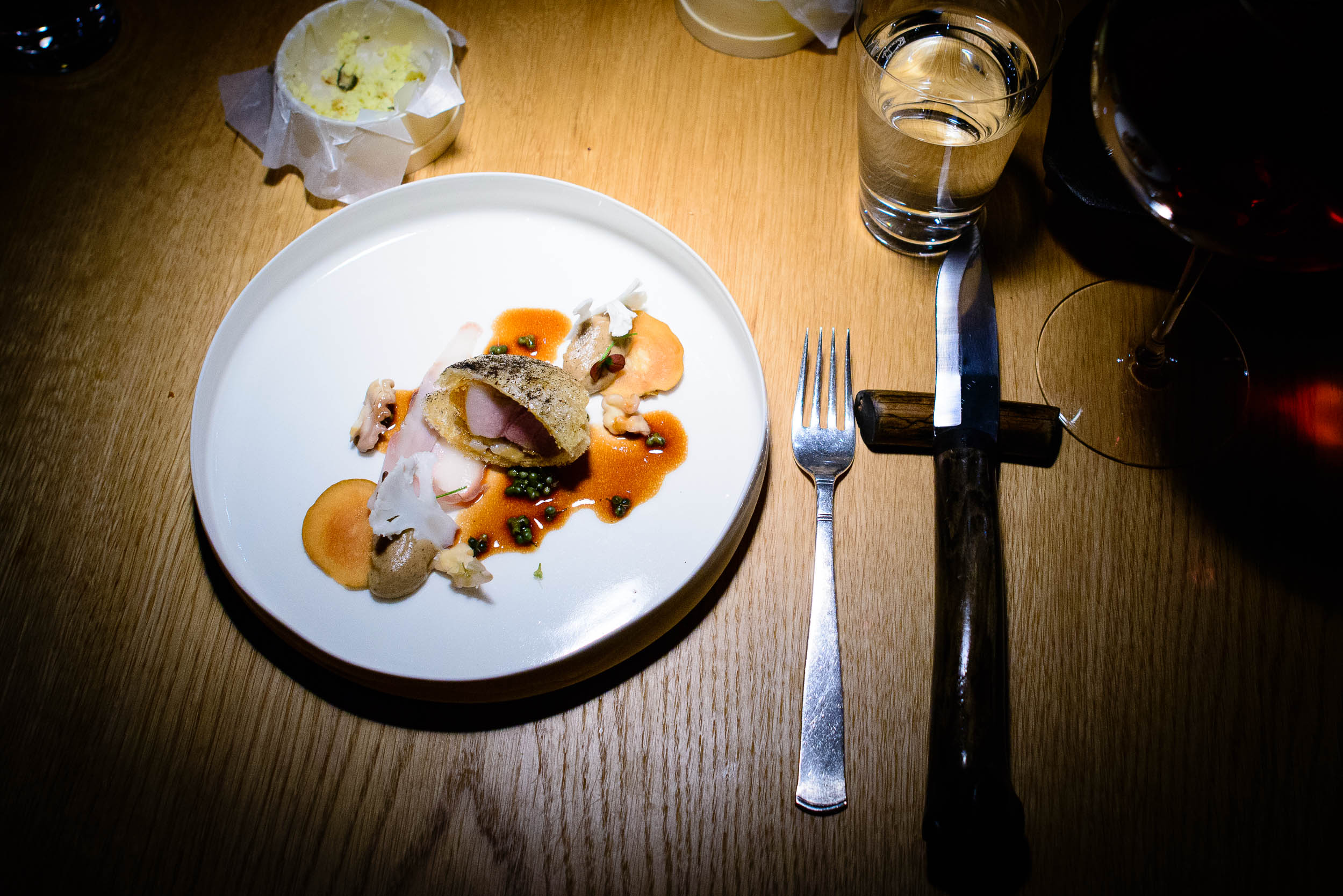 Filet of roe deer baked in birch bark with smoked marrow, celery