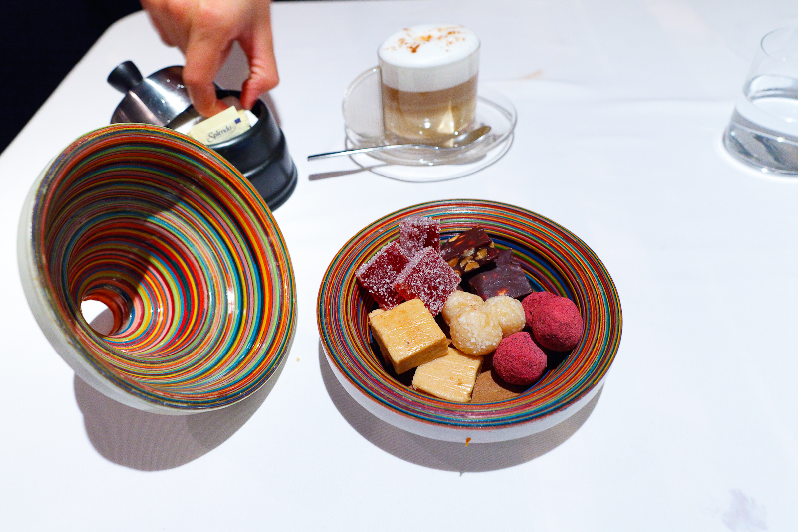 Petits fours: pâte des fruits, chocolate and hazelnuts, cocada (coconut ball), chocolate, Mexican mazapán (peanut squares)