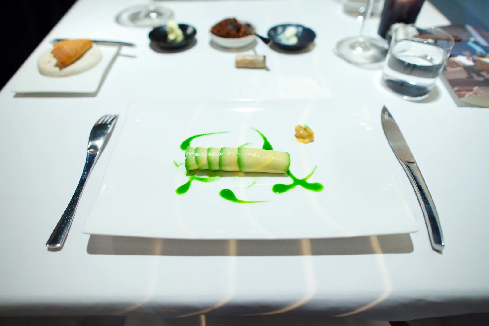 2nd Course: Flautas de aguacate rellenas de camarón cristal. Mayonesa de chipotle rallado. Emulsión de cilantro. (Avocado flautas with raw shrimp, chipotle mayo, cilantro emulsion)