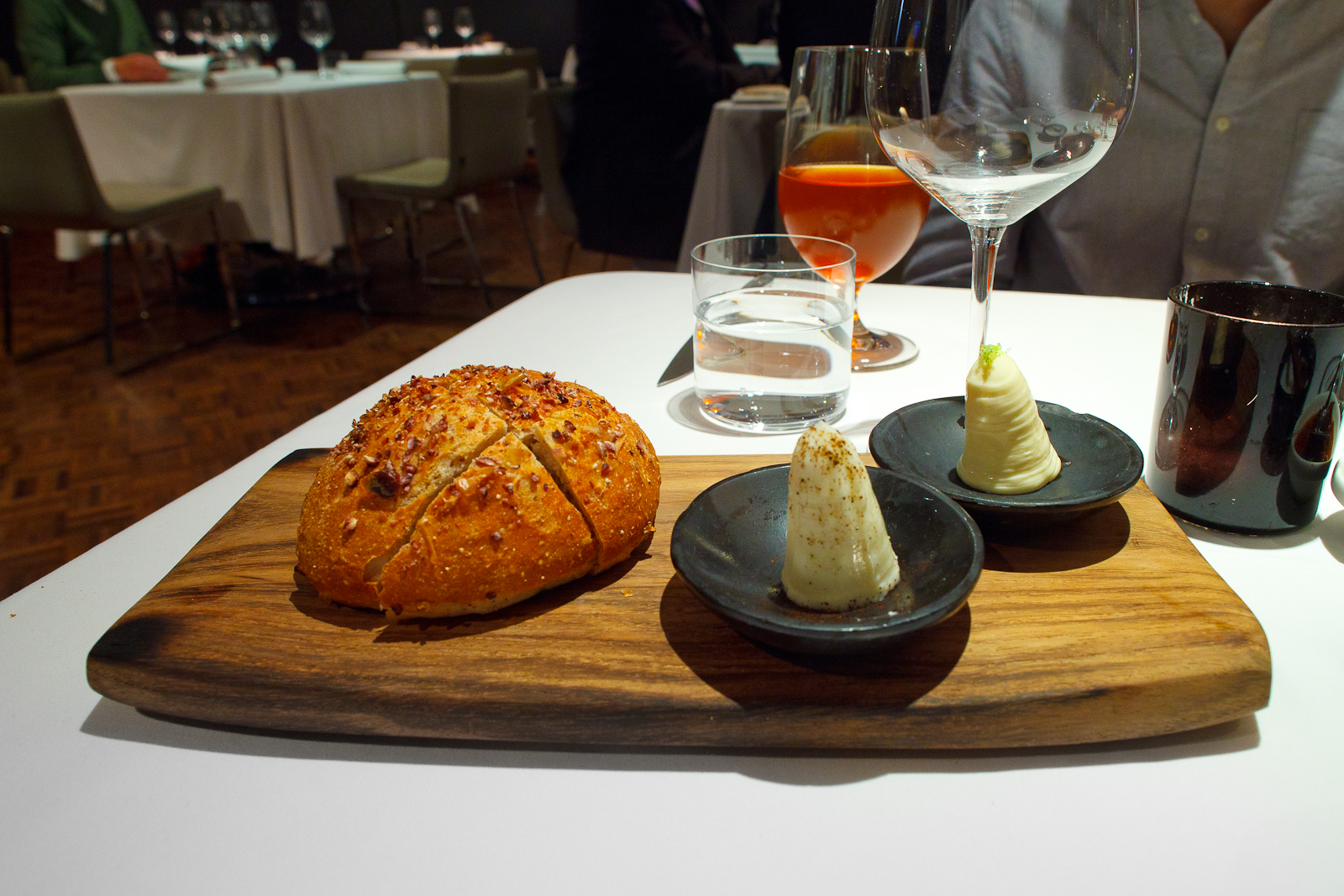 Bread encrusted in corn with goat milk and cow milk butter