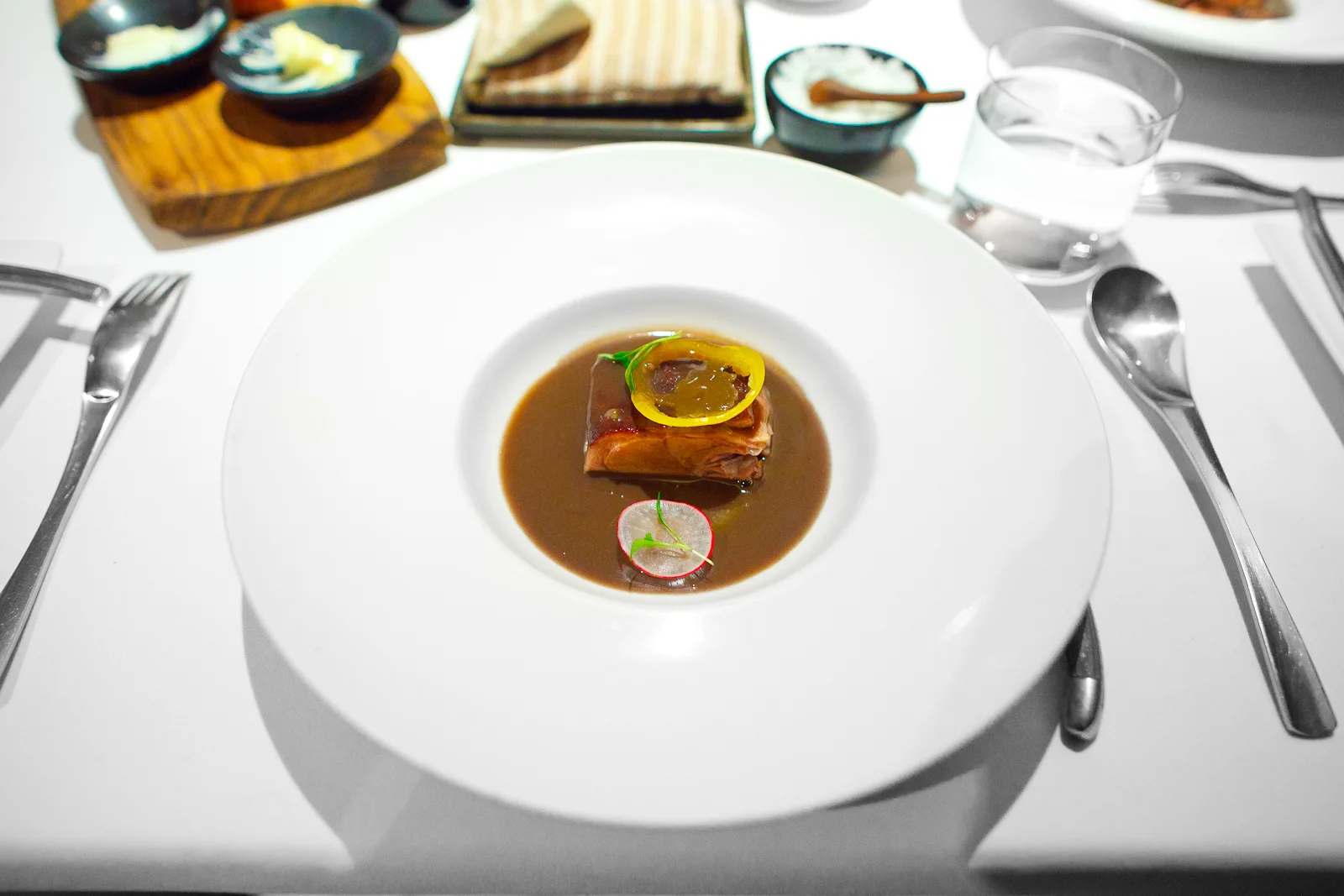 4th Course: bald pig from Yucatán, pork reduction with bean salsa, chile, radish
