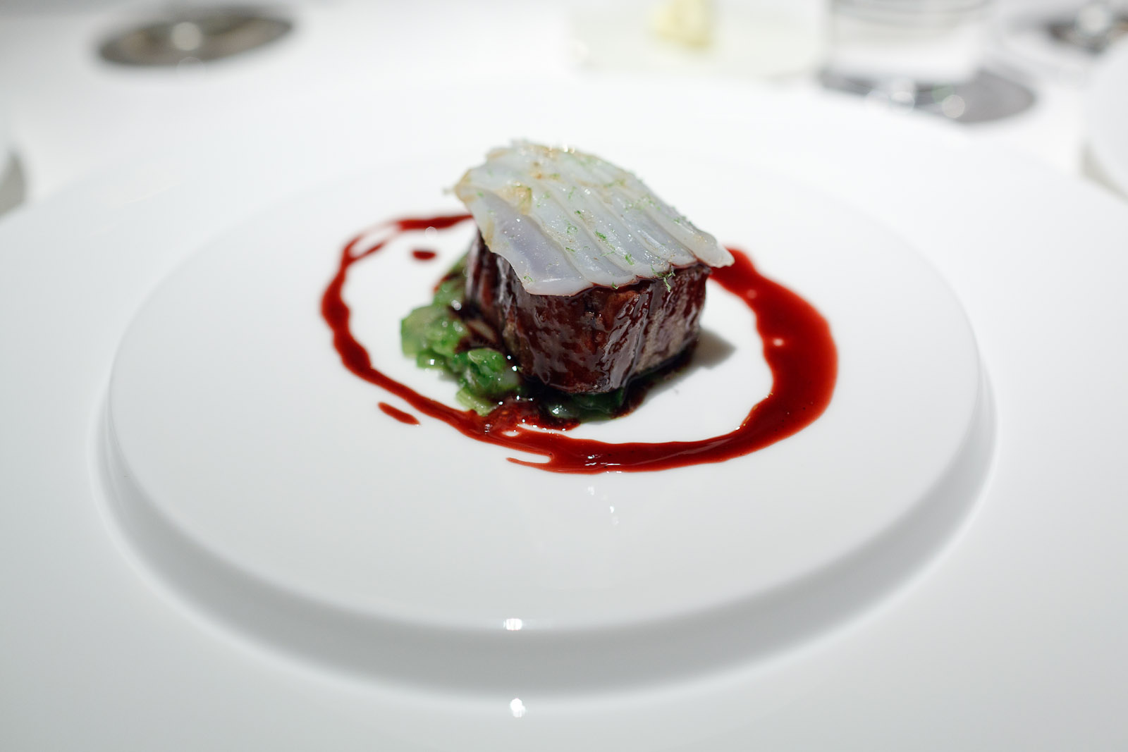 Pierre Gagnaire, Tokyo - Prime cut of grilled Hitachi beef, lacquered with red wine sauce, cuttlefish with lime, onion confit