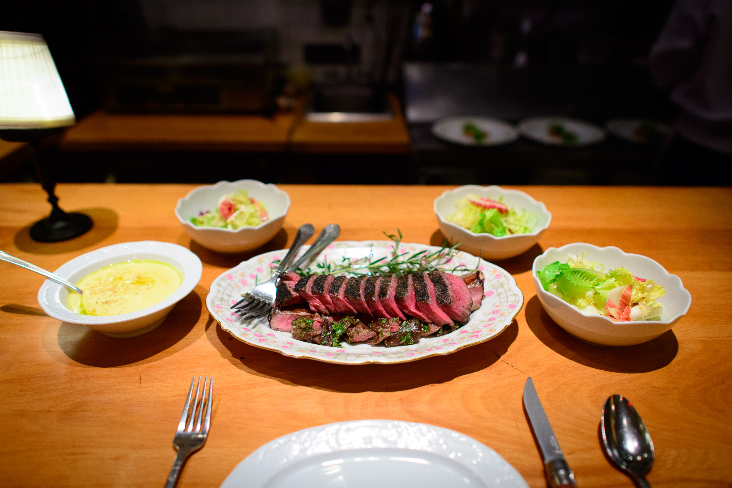 19th Course: Steak Torrisi, Torrisi polenta, greens salad with a