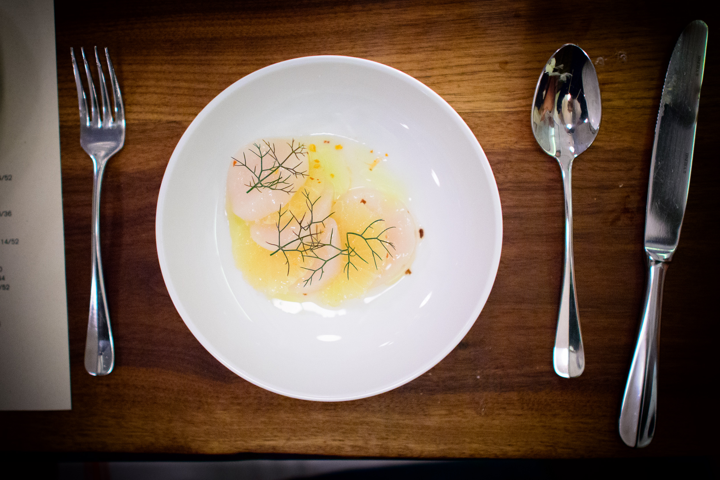 Raw scallops with citrus and bronze fennel ($16)