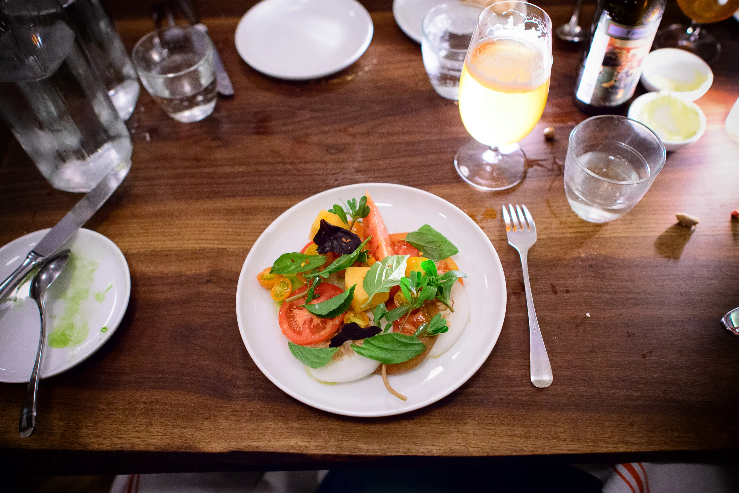 Tomatoes, melon, purslane, and basil ($14)