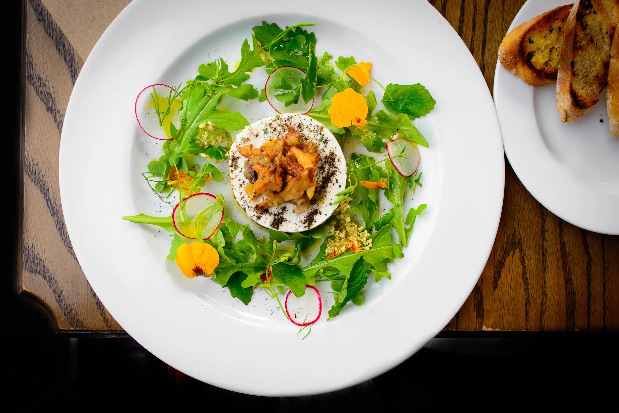 Mushrooms, goat's milk panna cotta, grilled baguette ($19)