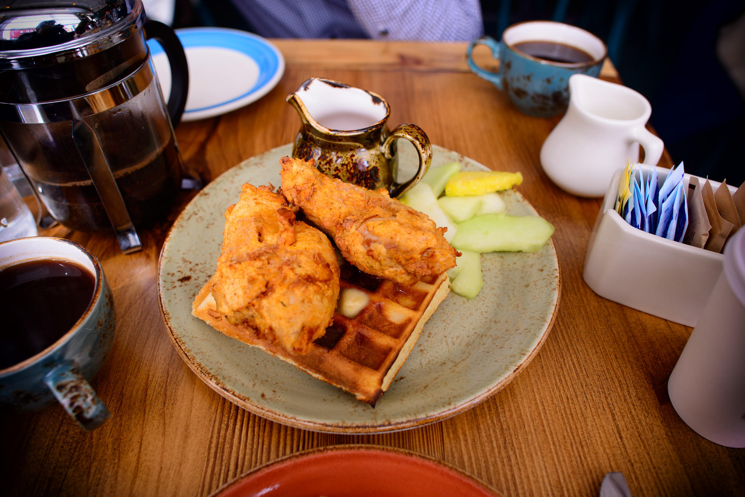 Fried chicken thigh, malted waffle, maple hot sauce ($11)