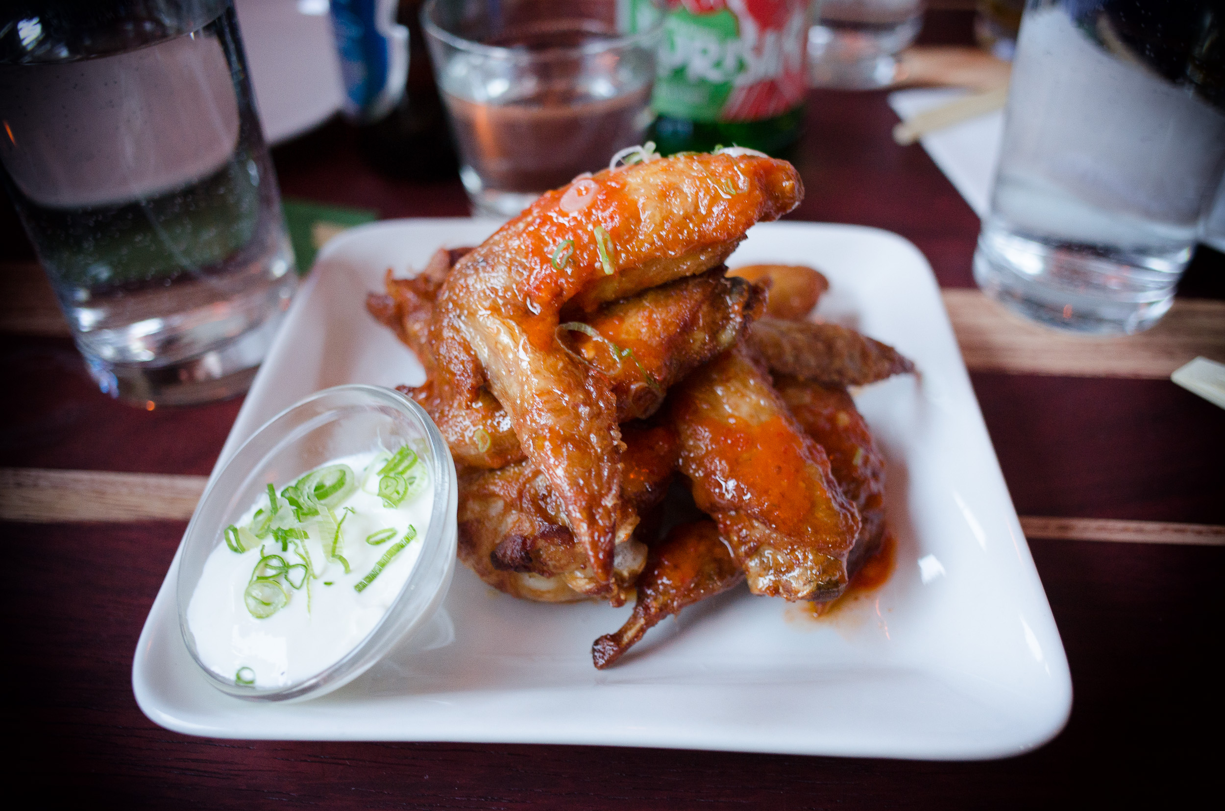 Spicy butter wings, ginger yogurt ($8)